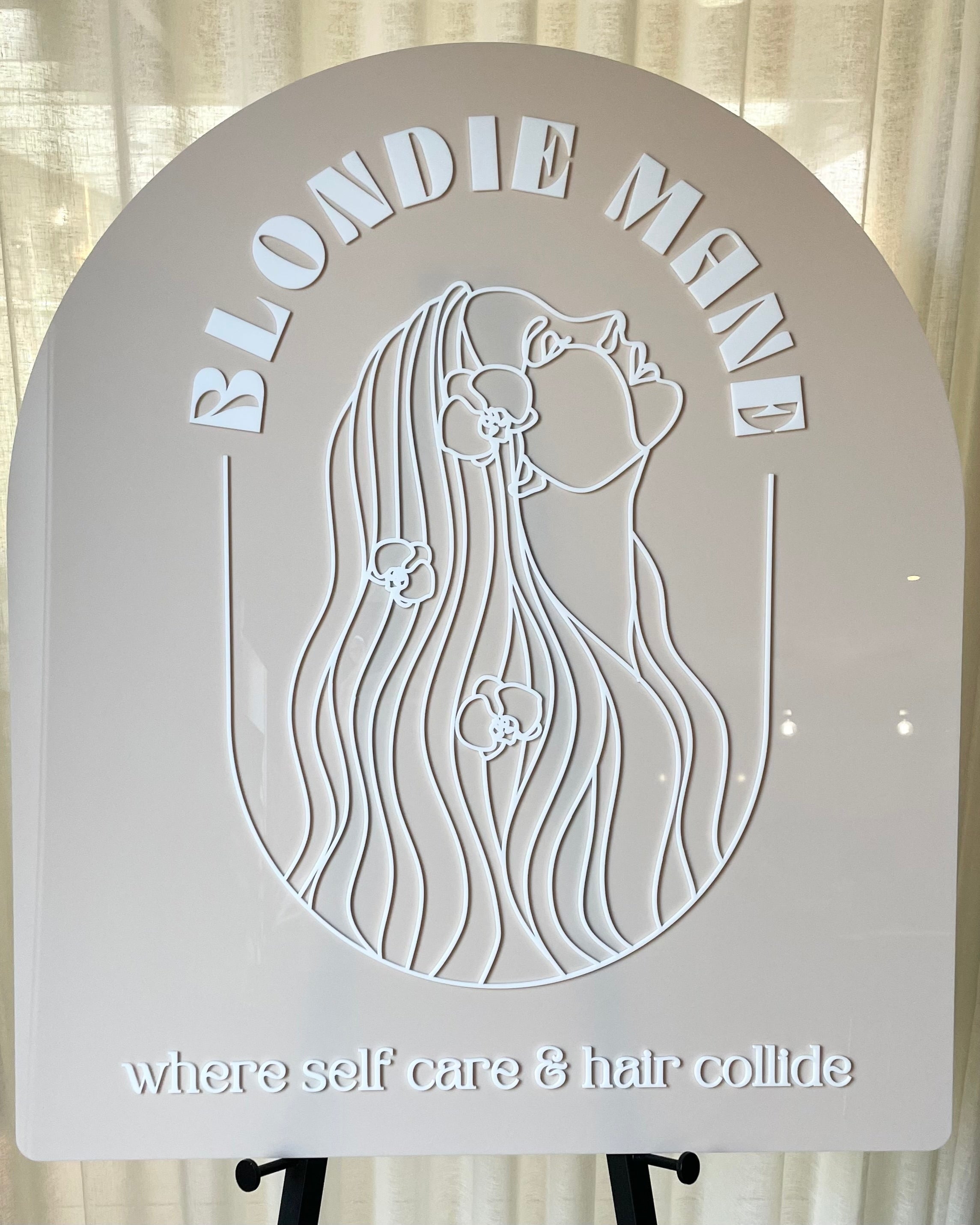 Beige arch sign with 3D white hair salon logo