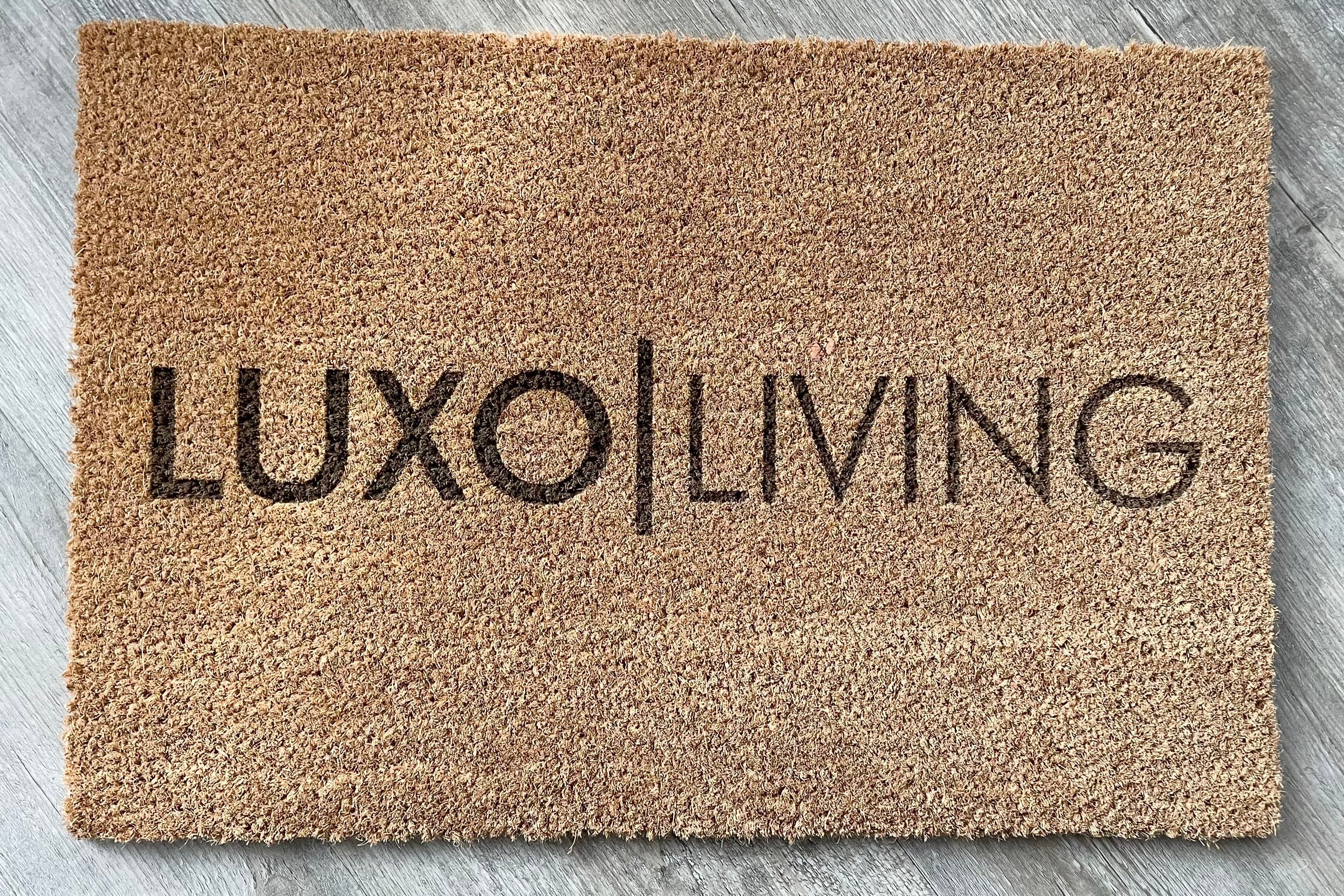 Luxo Living logo printed on a high quality door mat