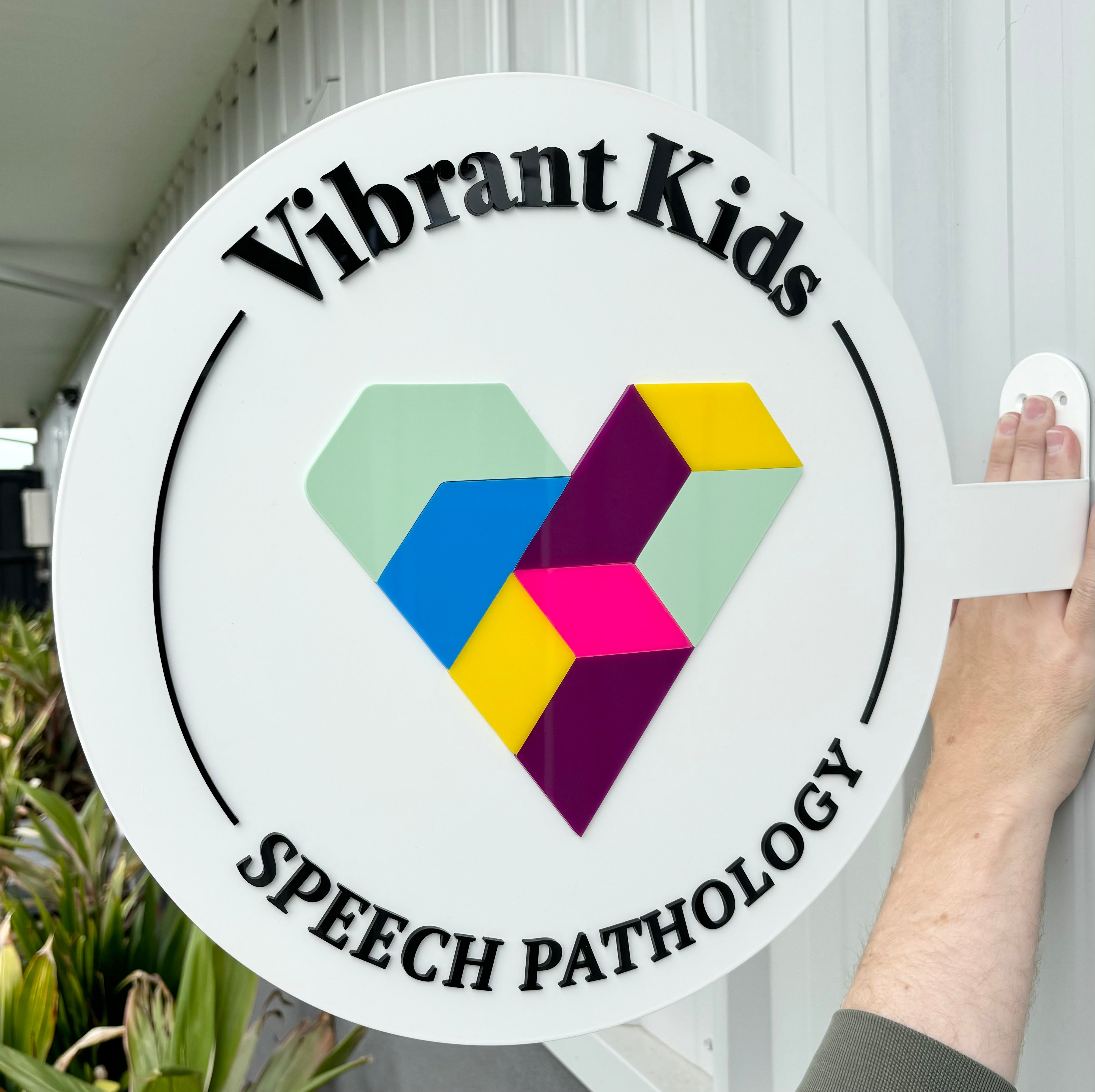 Vibrant Kids Speech Pathology colourful blade sign design