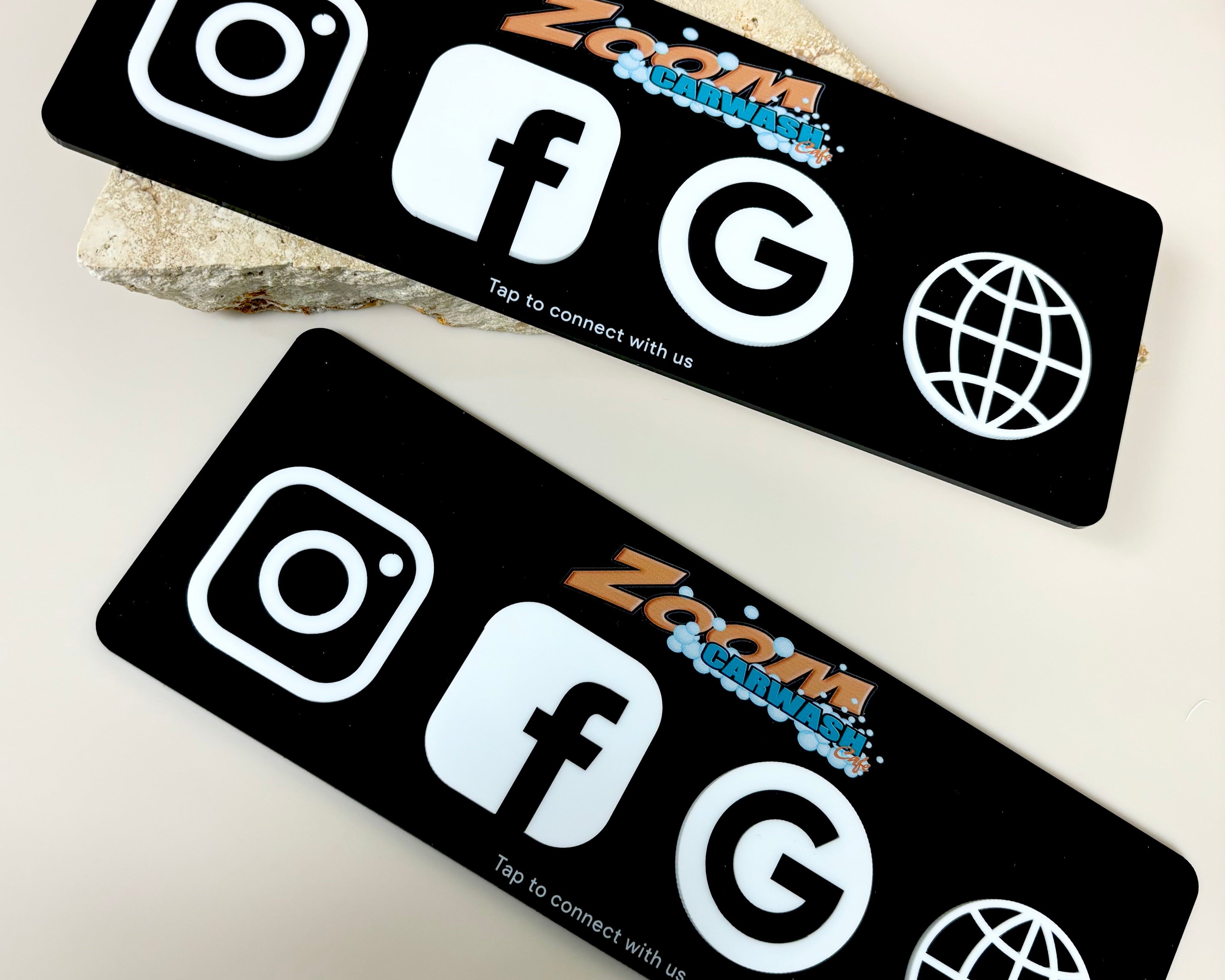 Black NFC social plaque with icons for Instagram, Facebook and website, custom branded.