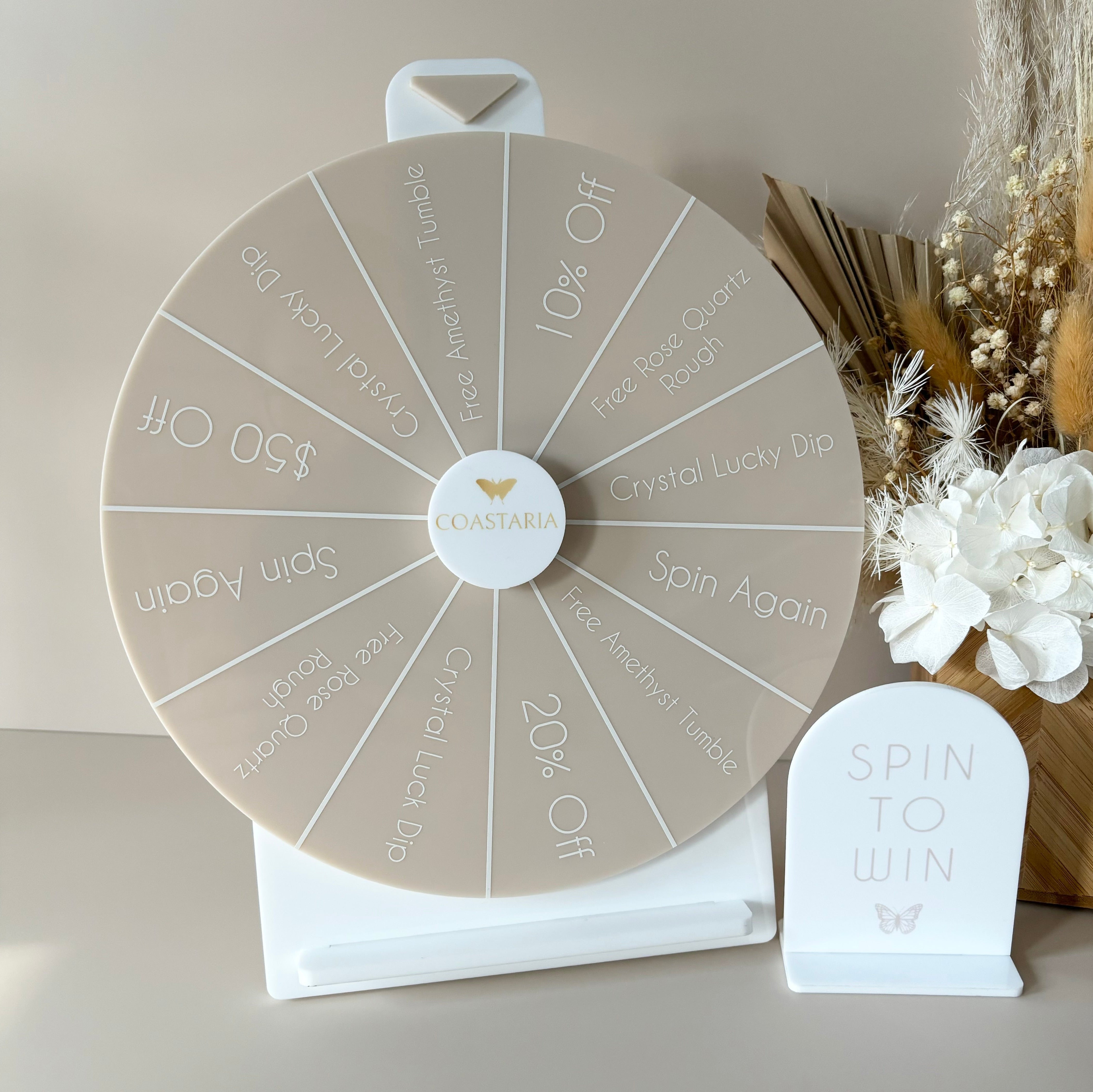 Beige spin the wheel with stand for in store promotions