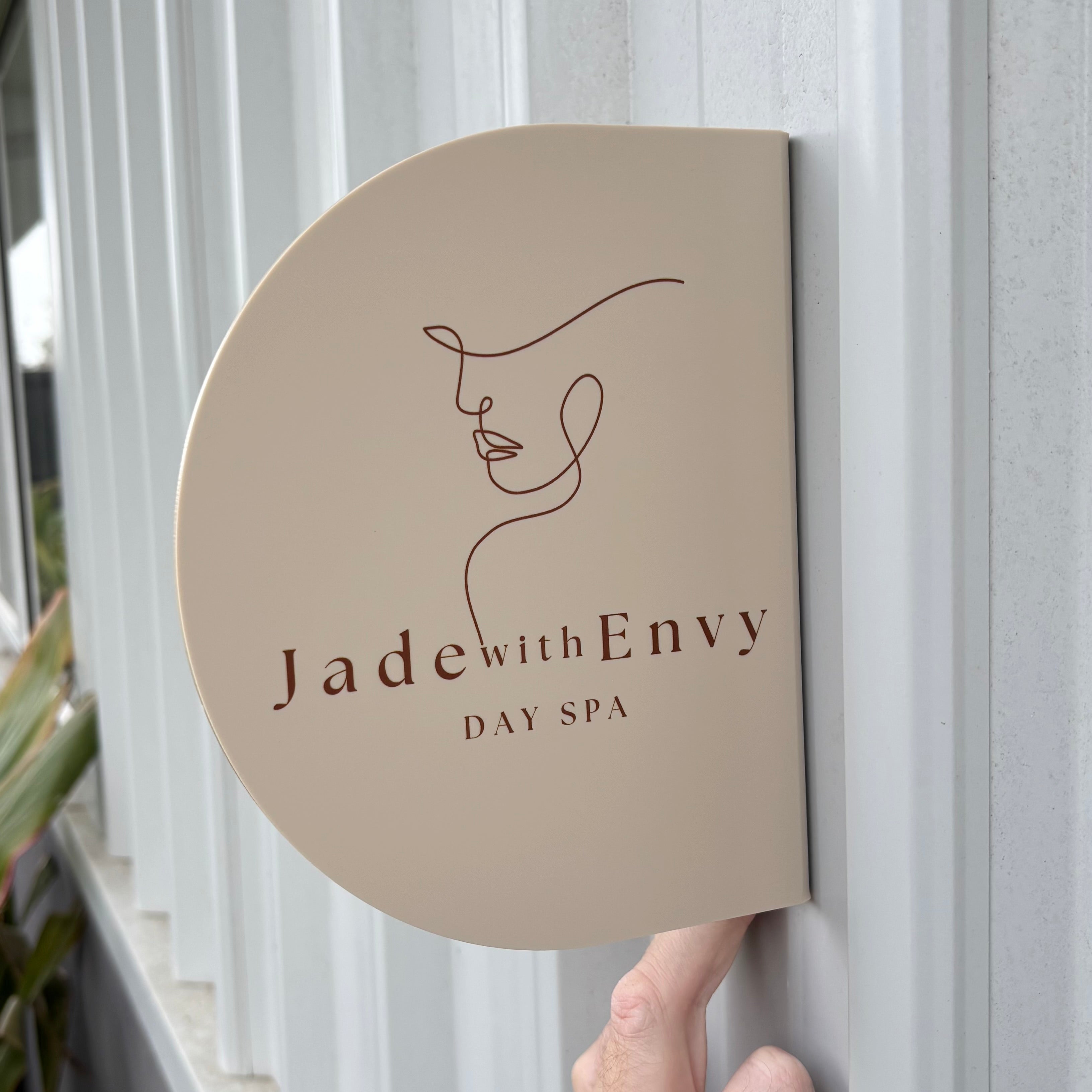 Custom UV printed acrylic blade sign with business logo, personalised double sided wall mounted sign for beauty salons, day spas and wellness businesses.