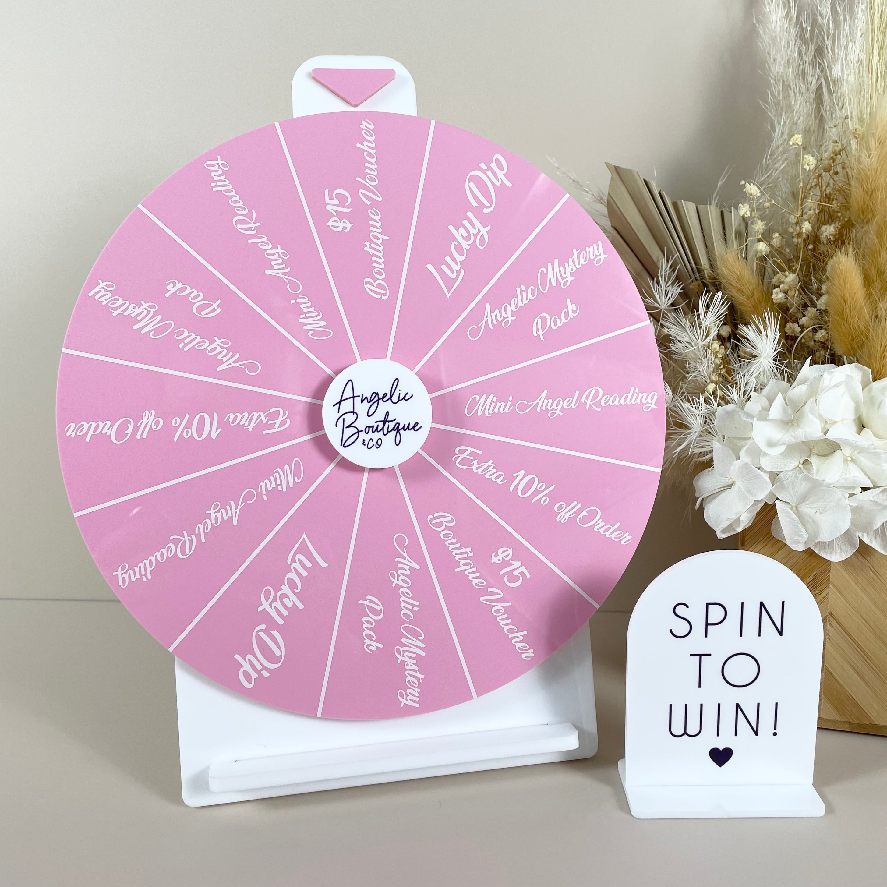 Pink custom spin the wheel for beauty salon promotions