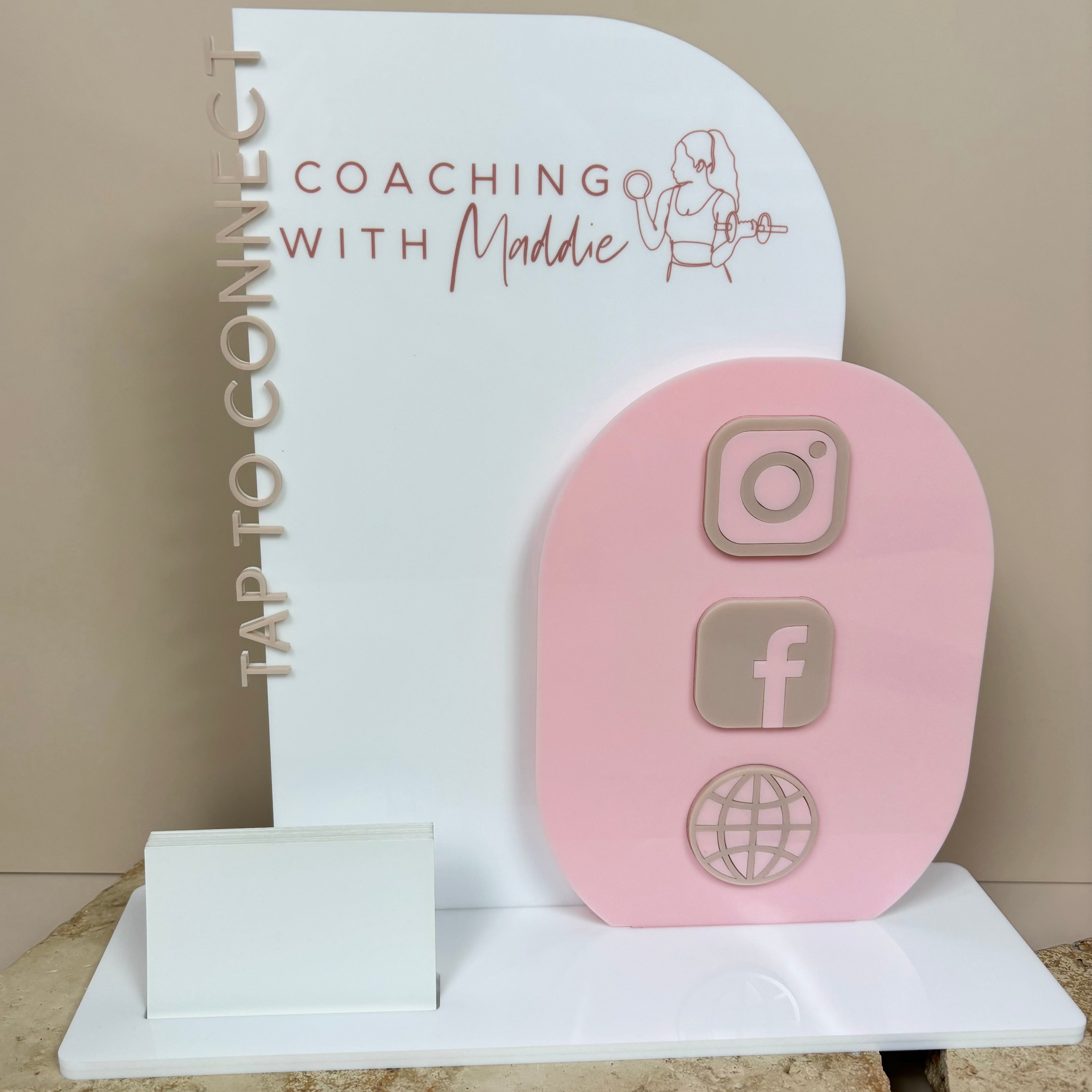 Pink NFC business display for life coaching with tap to connect icons