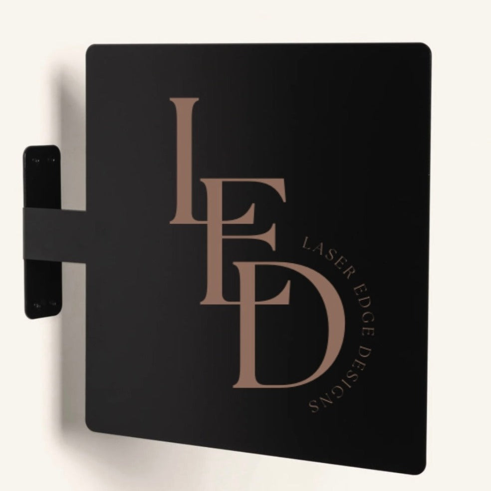 Modern square projecting sign in black with rose gold logo, custom acrylic business signage made in Australia