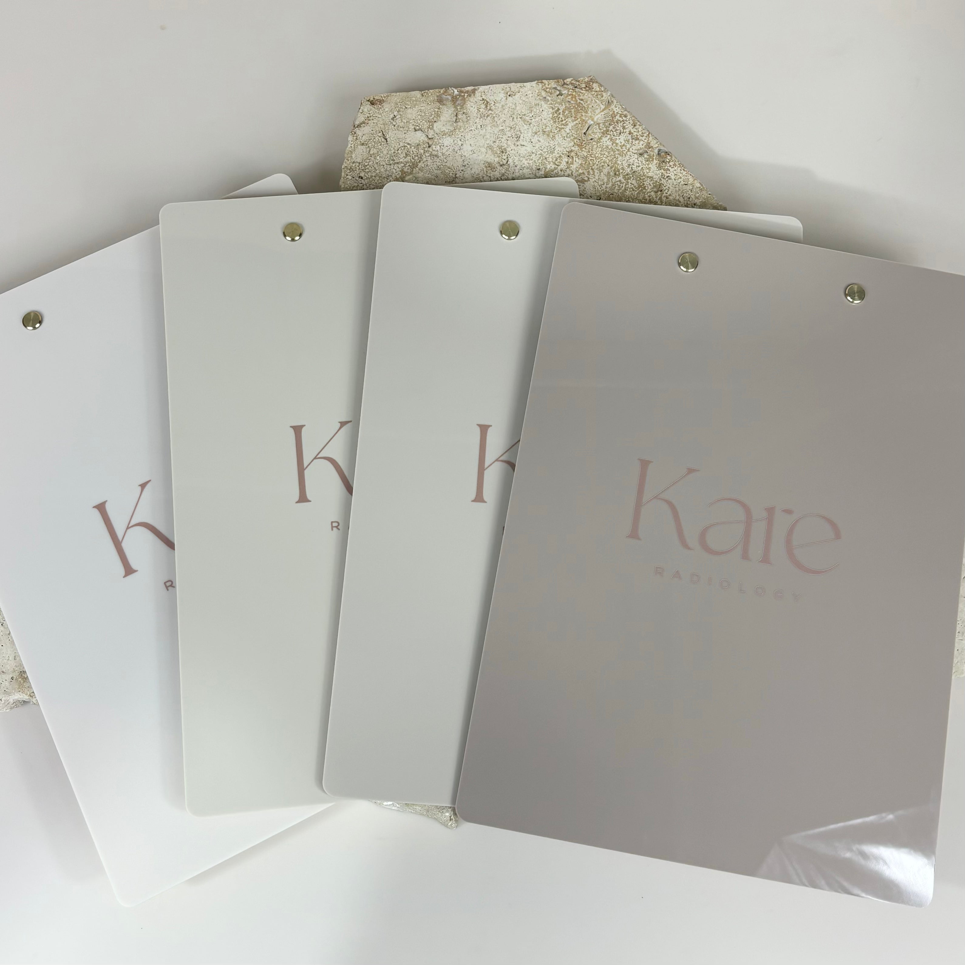 Set of custom clipboards with logo printed for staff use