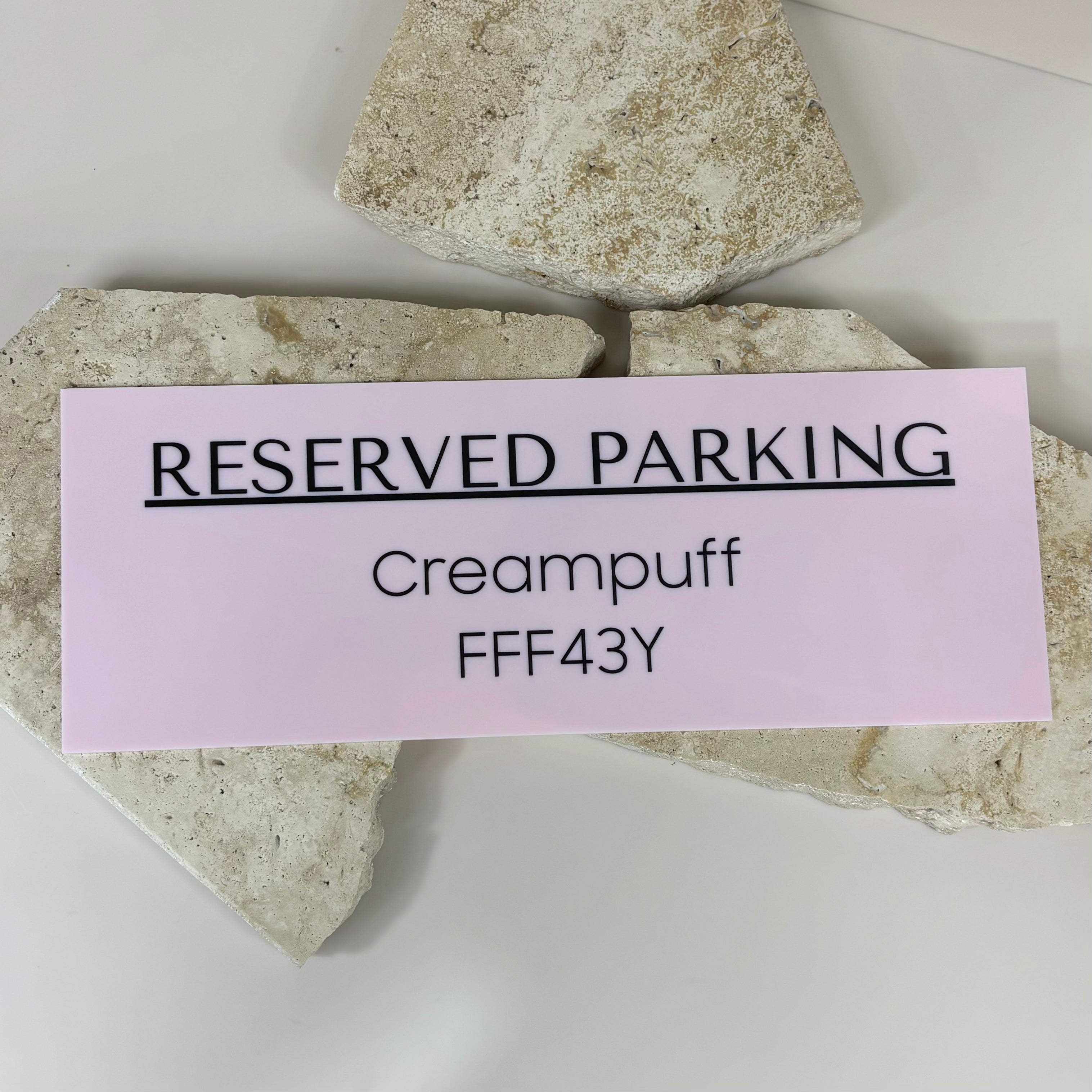Customisable reserved parking sign in pink – personalised parking space signage