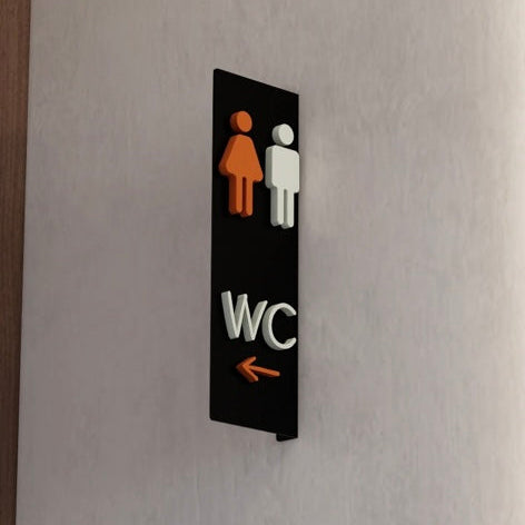 Wall-mounted rectangle toilet blade sign with male and female icons, directional business signage
