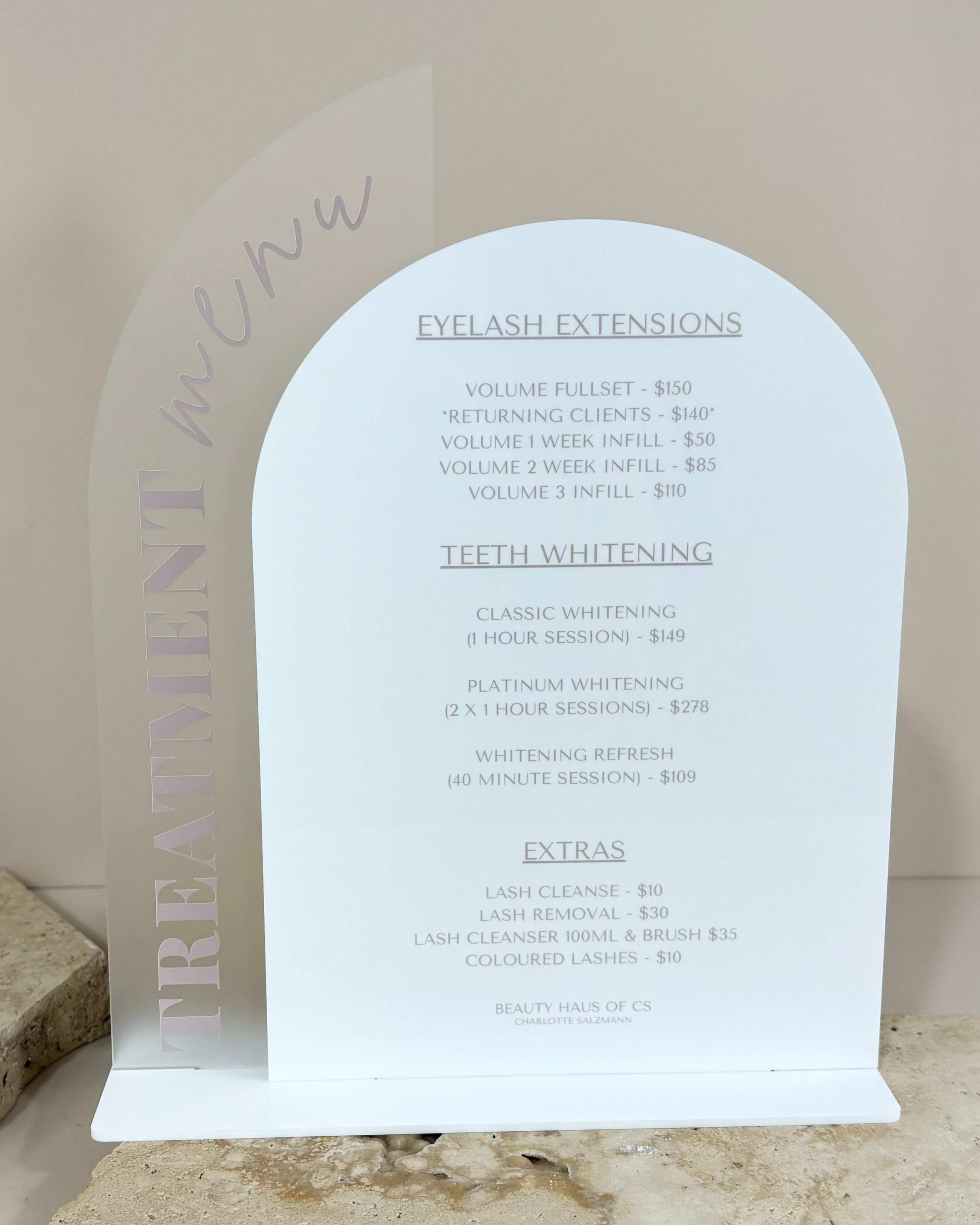 Frosted and white double arch info board with engraved salon service list
