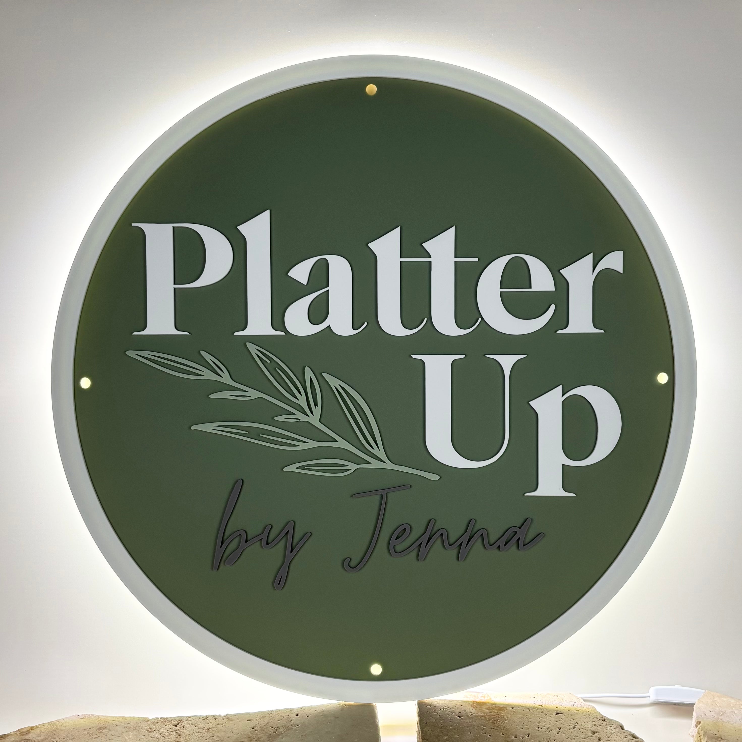 Round backlit acrylic business sign with logo “Platter Up by Jenna” – custom signage for small businesses