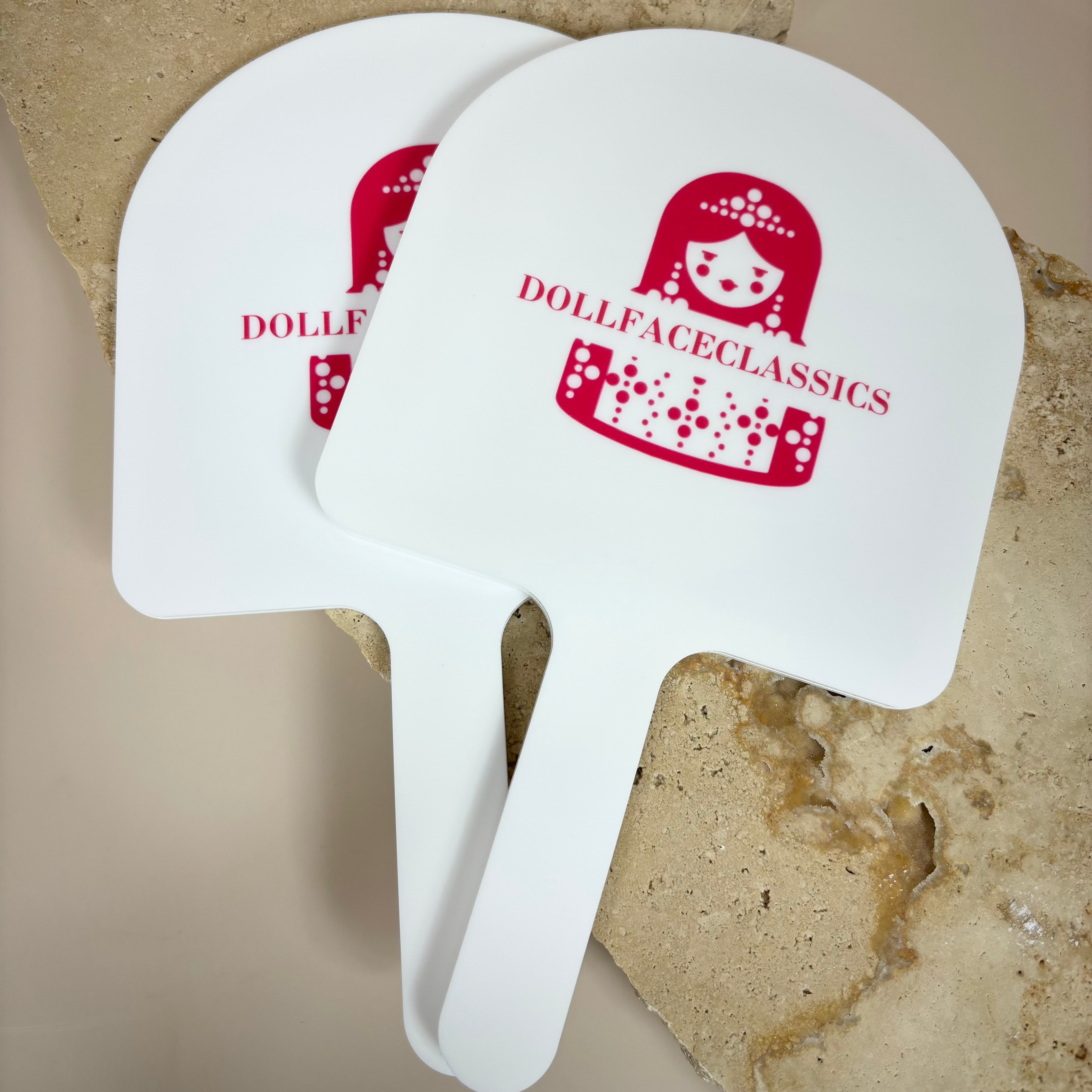 Custom arched handheld mirrors with pink cosmetic logo