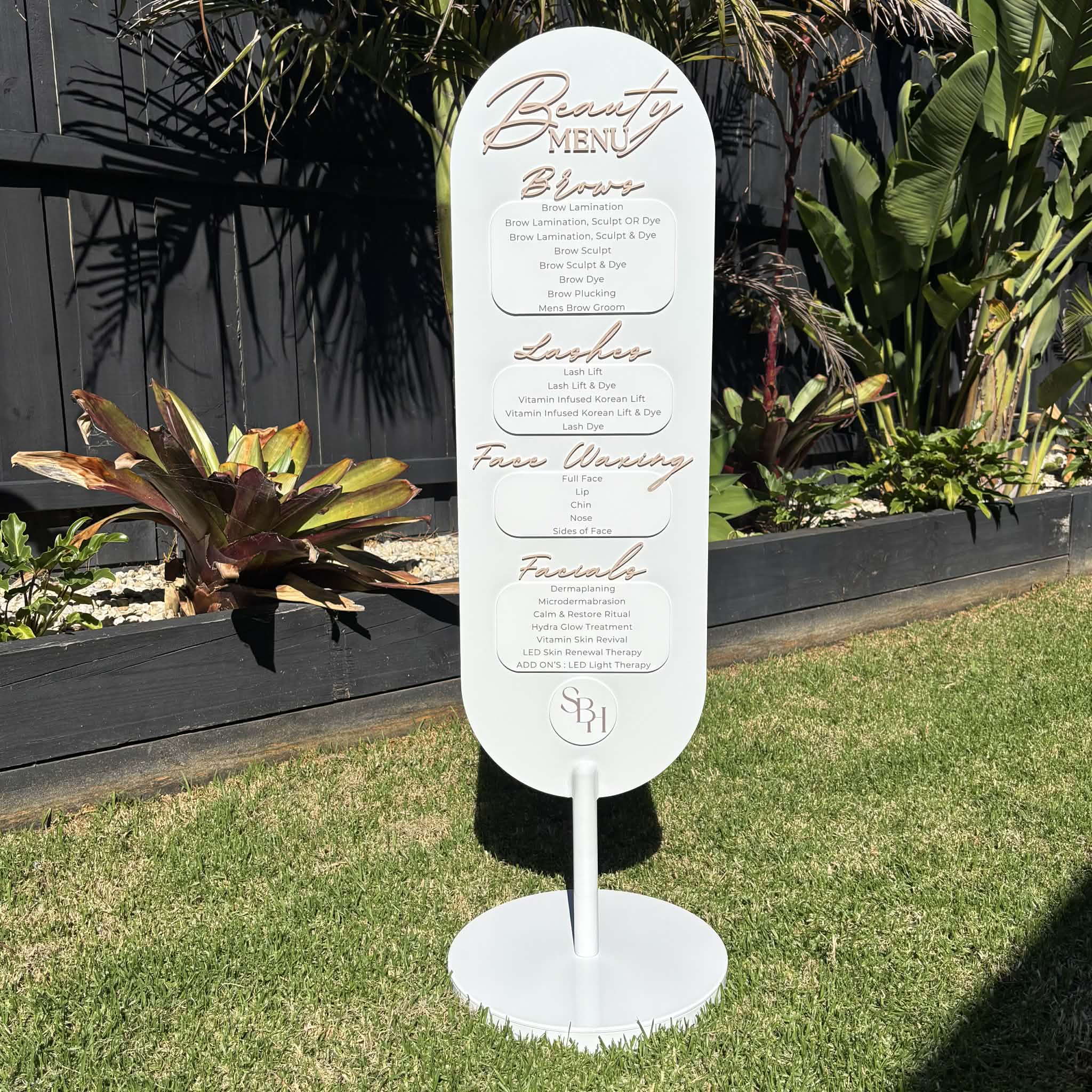 Oval acrylic business display sign with raised logo, QR code and social media details, freestanding salon sign double sided for client attraction outdoor signage Australia