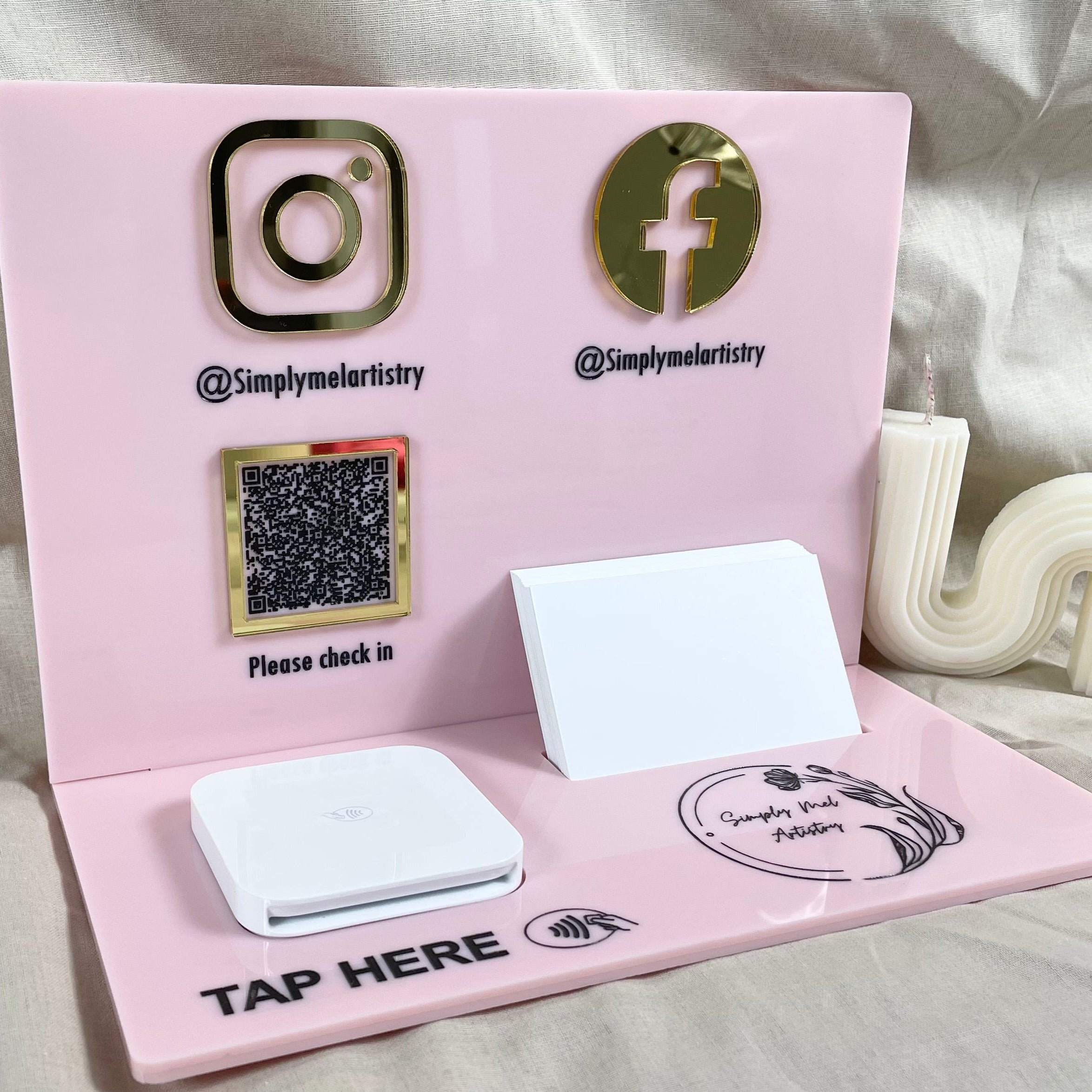 Pink acrylic business station with engraved Instagram and Facebook