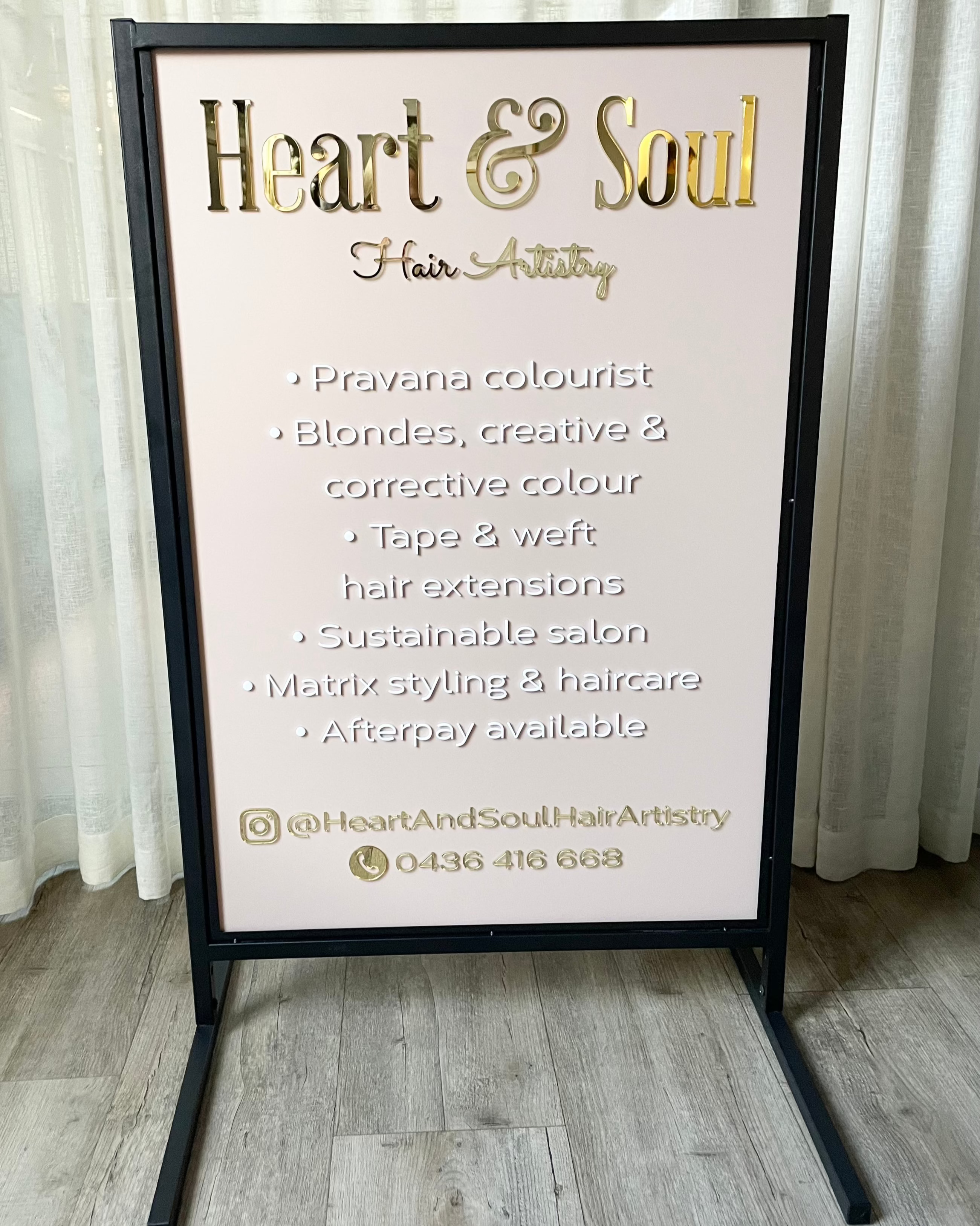 Cream acrylic T frame sign for treatment price list