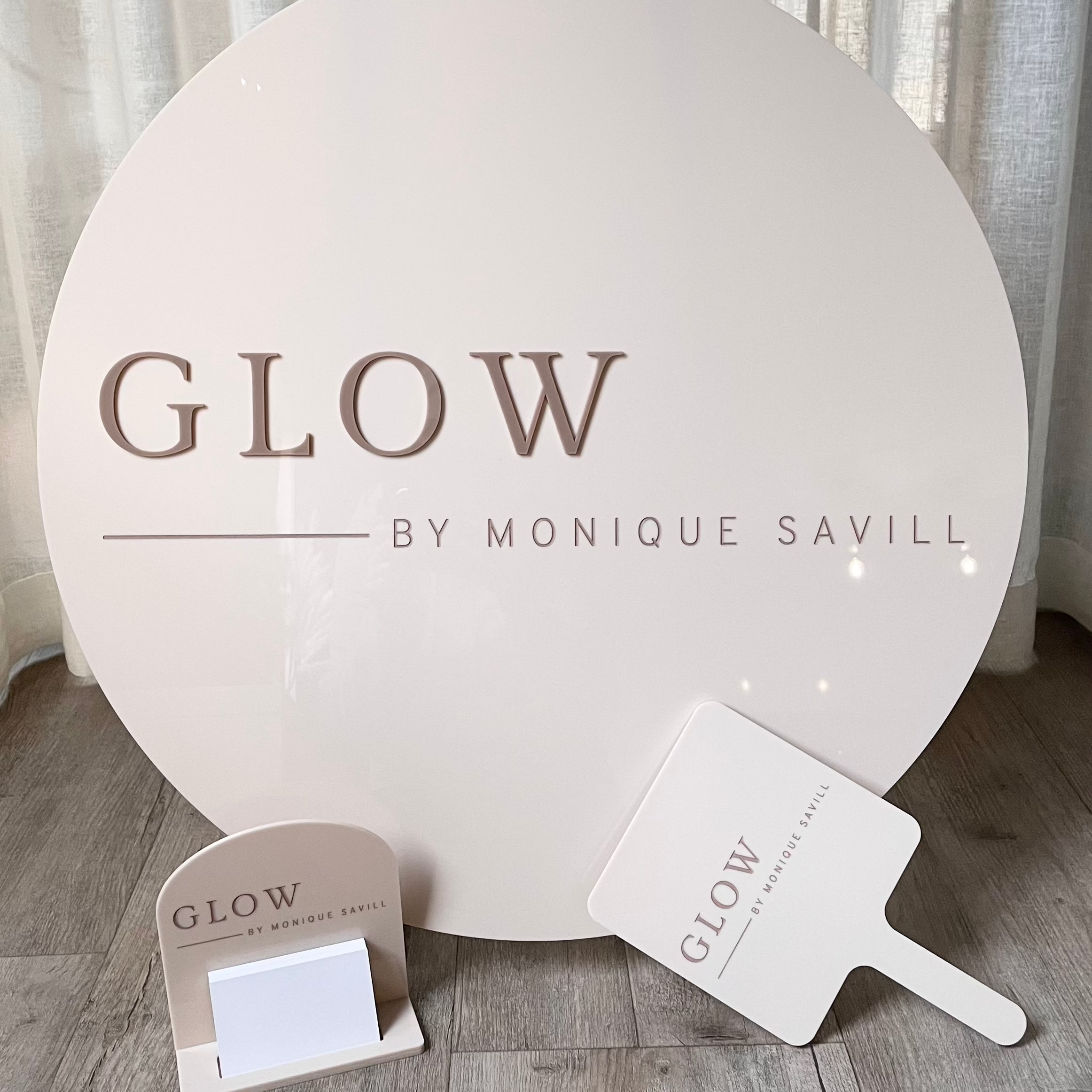 Glow by Monique Sayill round acrylic sign set for skincare business