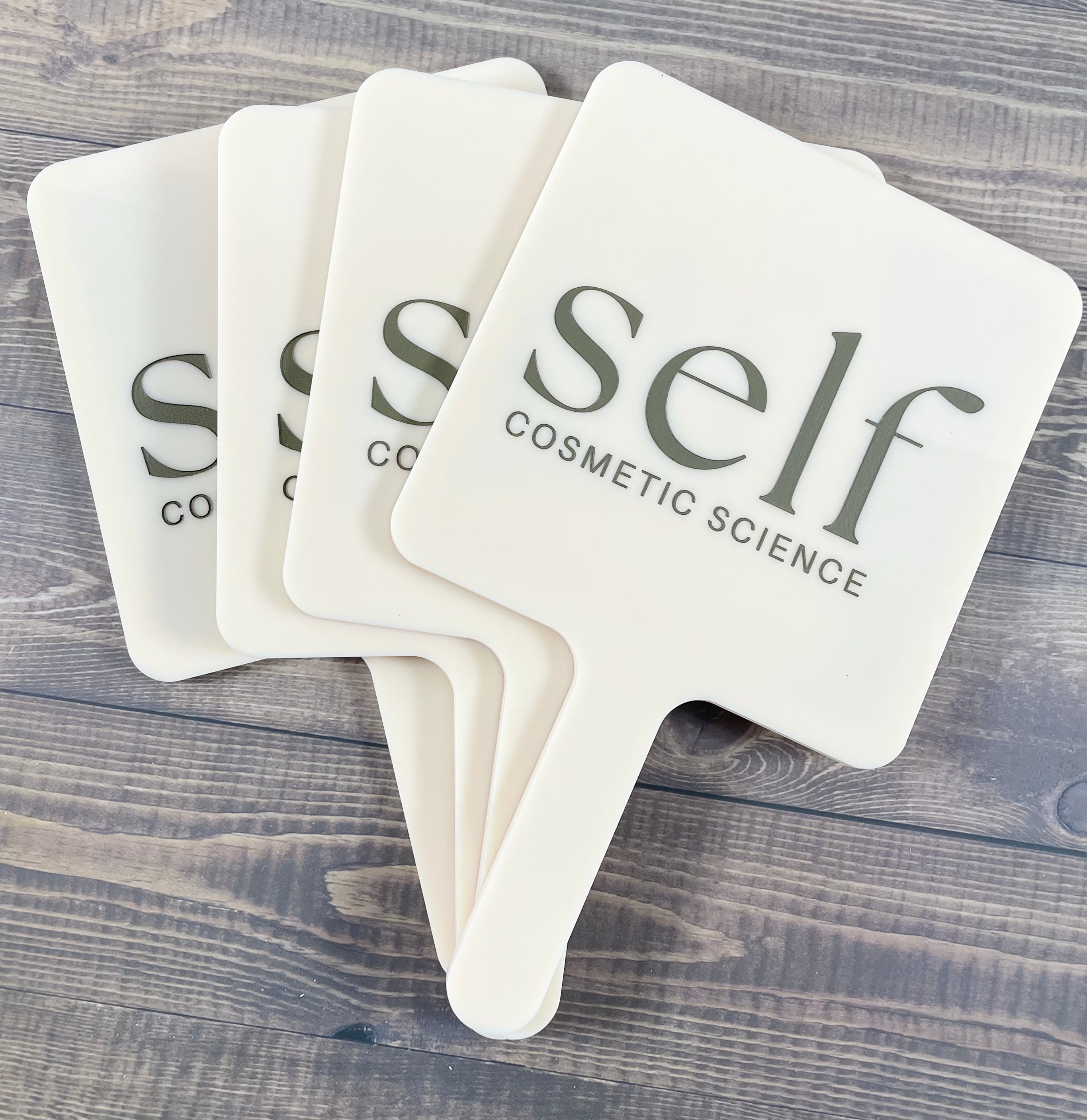 Self Cosmetic Business logo on square salon handheld mirrors