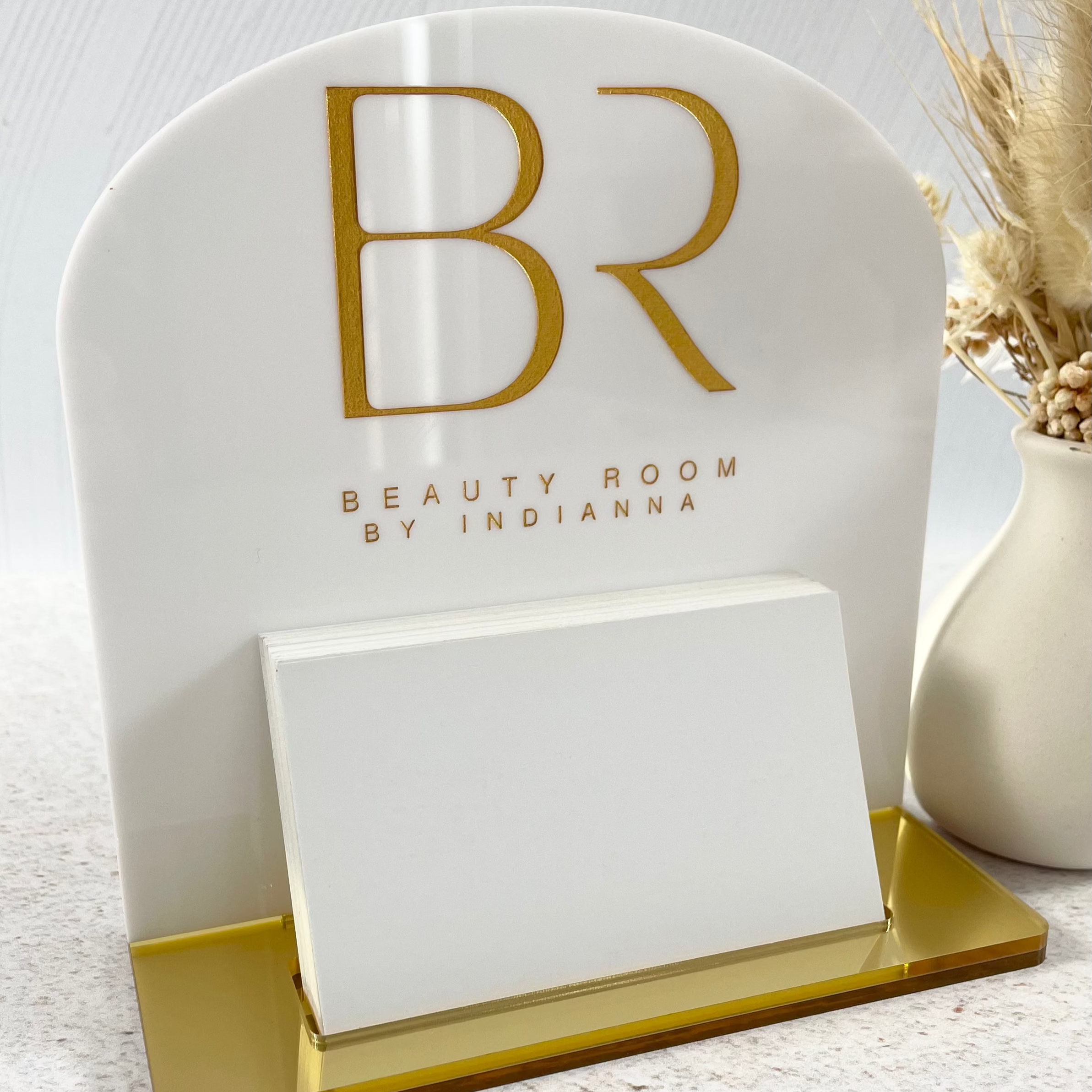 Acrylic card stand with minimalist design and logo branding