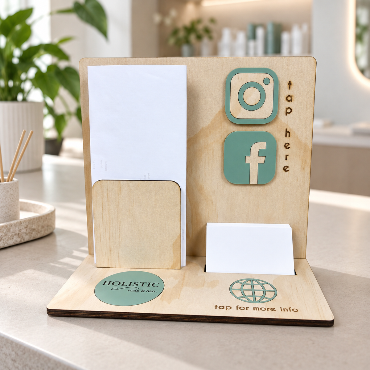 Custom timber NFC business display for a holistic scalp and hair business, featuring Instagram, Facebook and website tap-to-connect icons with brochure and business card holders.