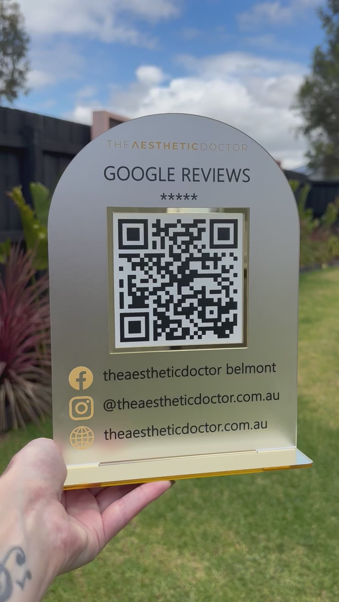 Custom QR code review sign displayed outdoors for small business promotion. Video
