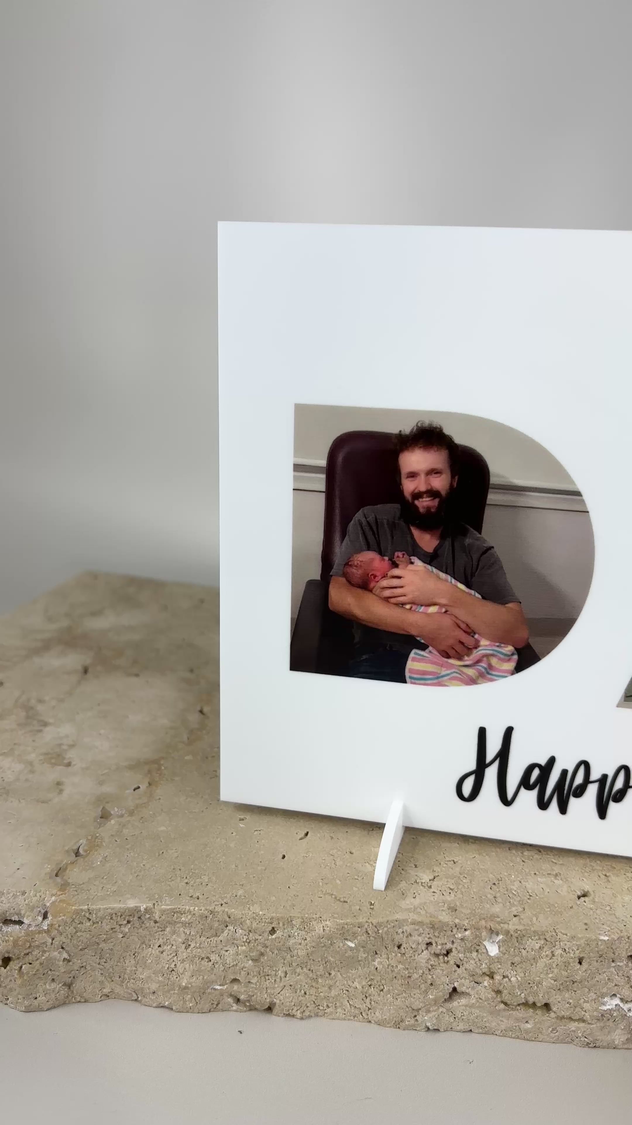 Video of personalised Father’s Day photo sign with custom images inside DAD cutout, acrylic photo display gift for dads, perfect for Father’s Day celebrations.