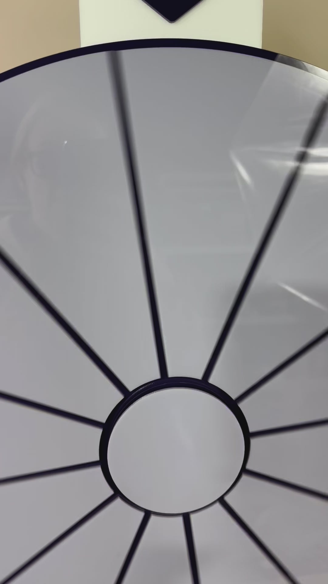 Close up of grey custom spin the wheel segments for trade shows and retail events