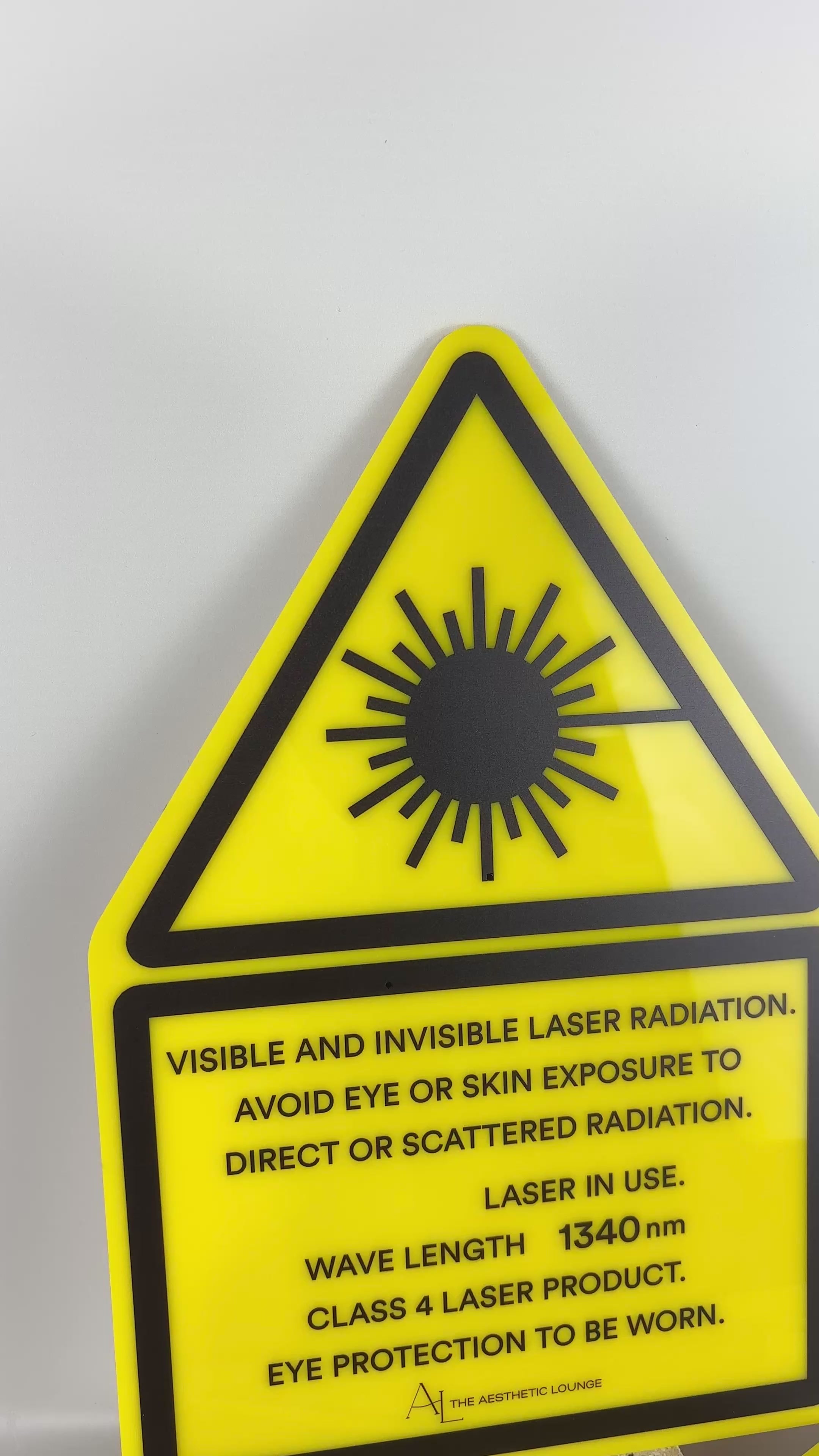Custom acrylic laser safety signage with high visibility hazard design and eye protection warning for Class 4 laser equipment