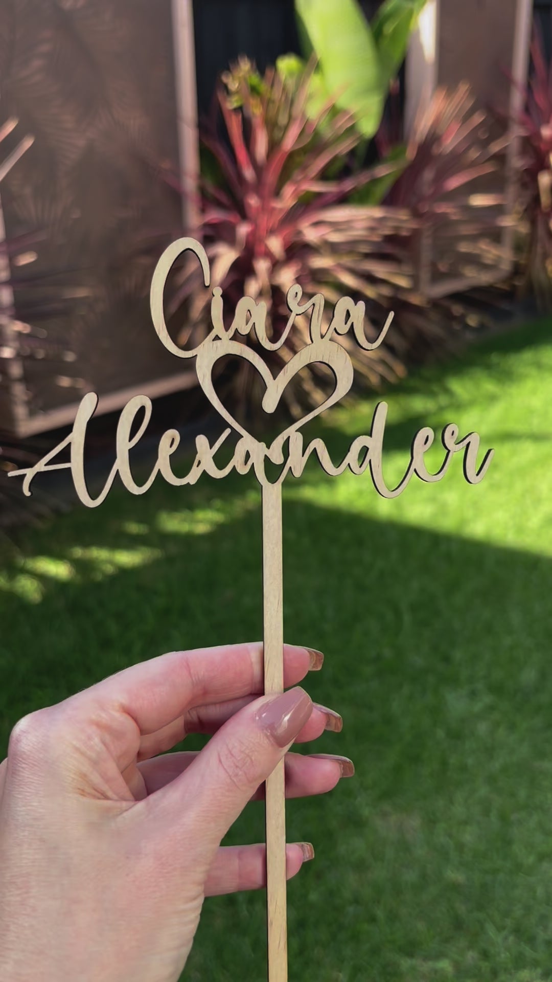 Custom wooden cake topper with name and heart detail laser cut. Video