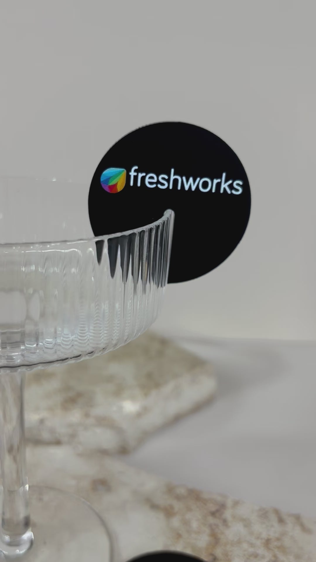 Close up of black branded drink tag with fork symbol. Video