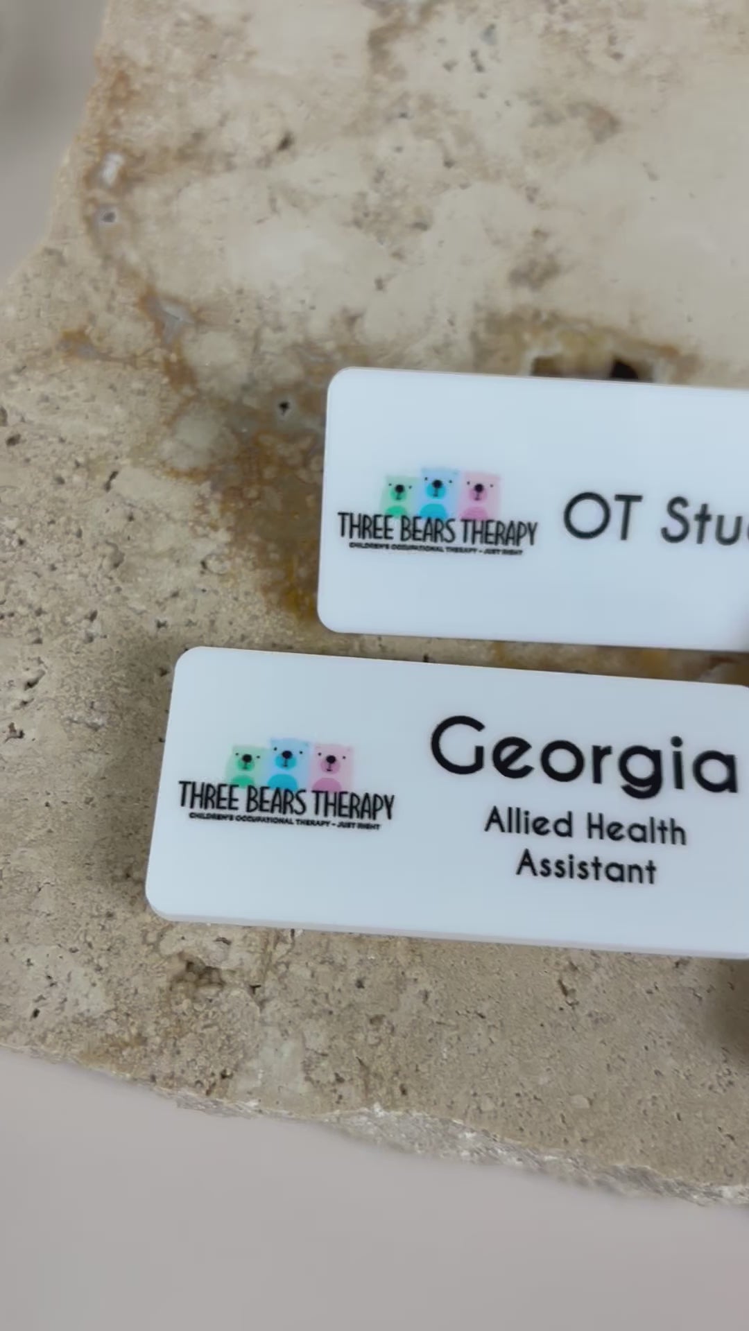 White custom name badges with full colour business logos. Video