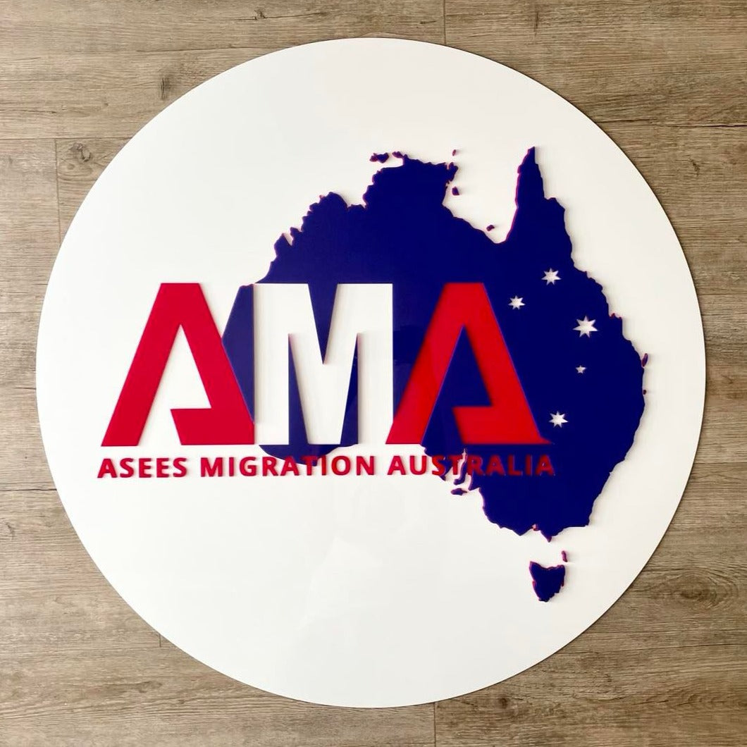 bold red and blue logo on round white acrylic. ama migration