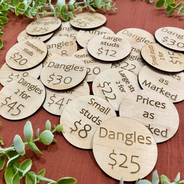Engraved wooden price discs with clear lettering for market stall use