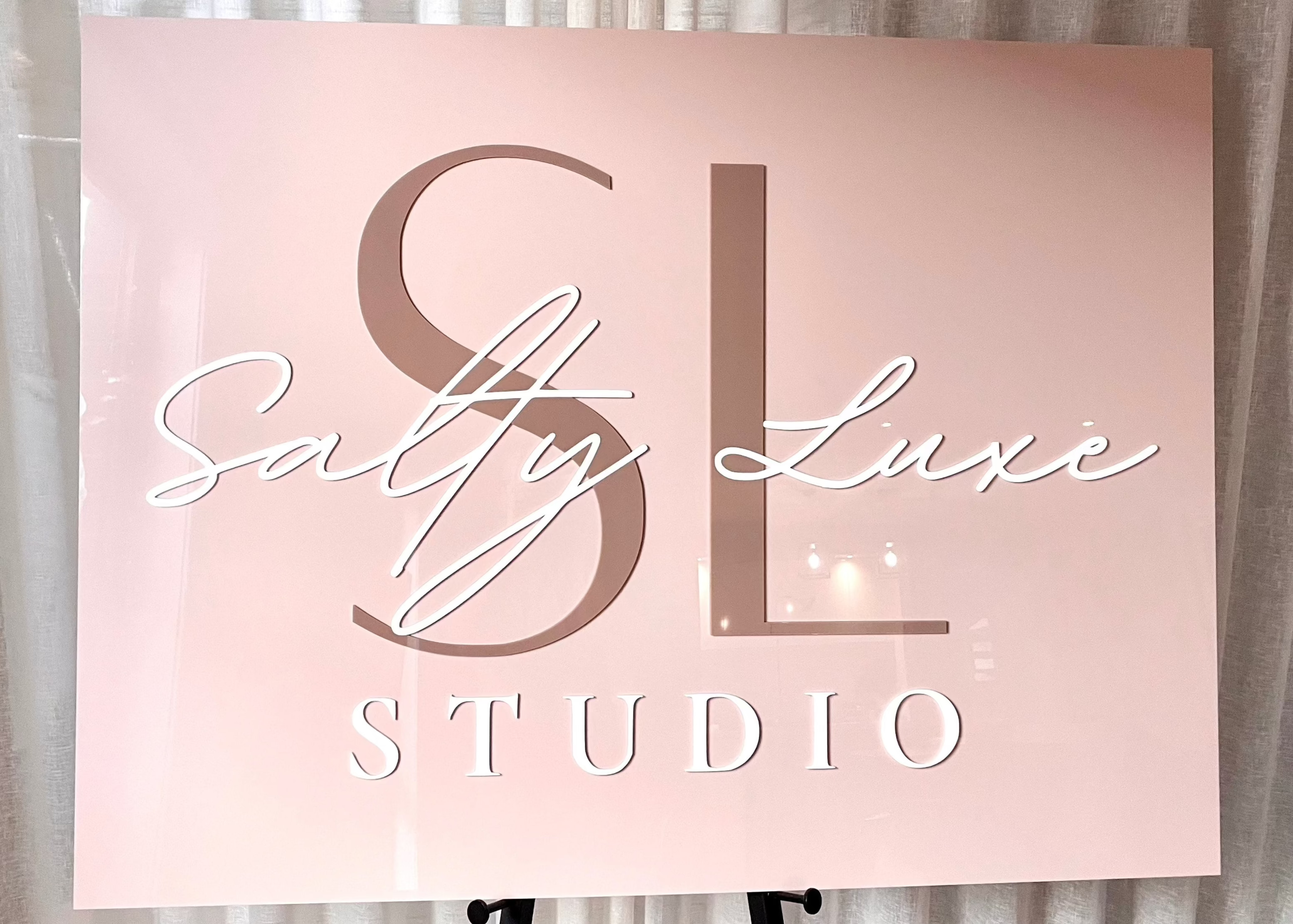 Salty Luxe Studio acrylic signage in blush tones