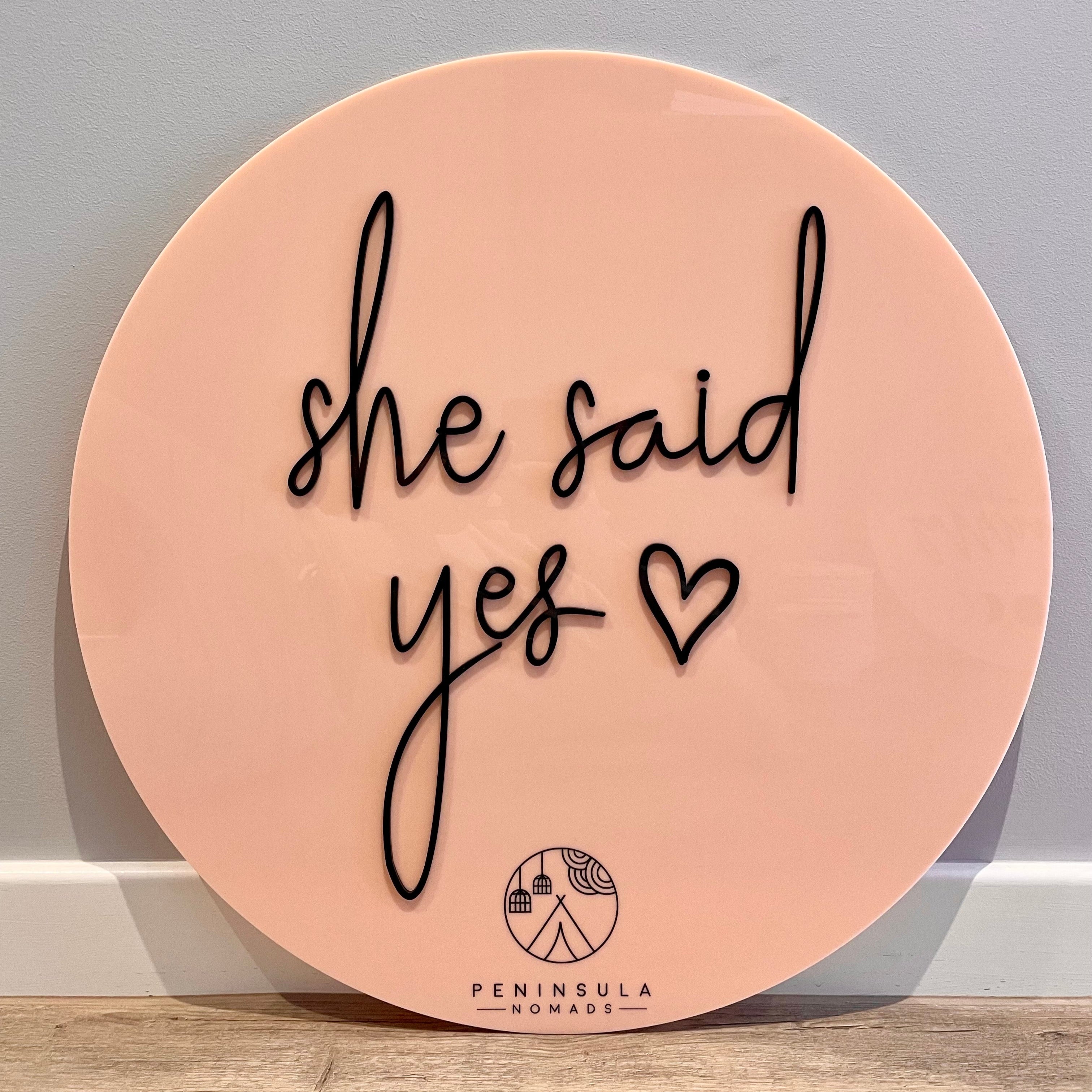 she said yes sign