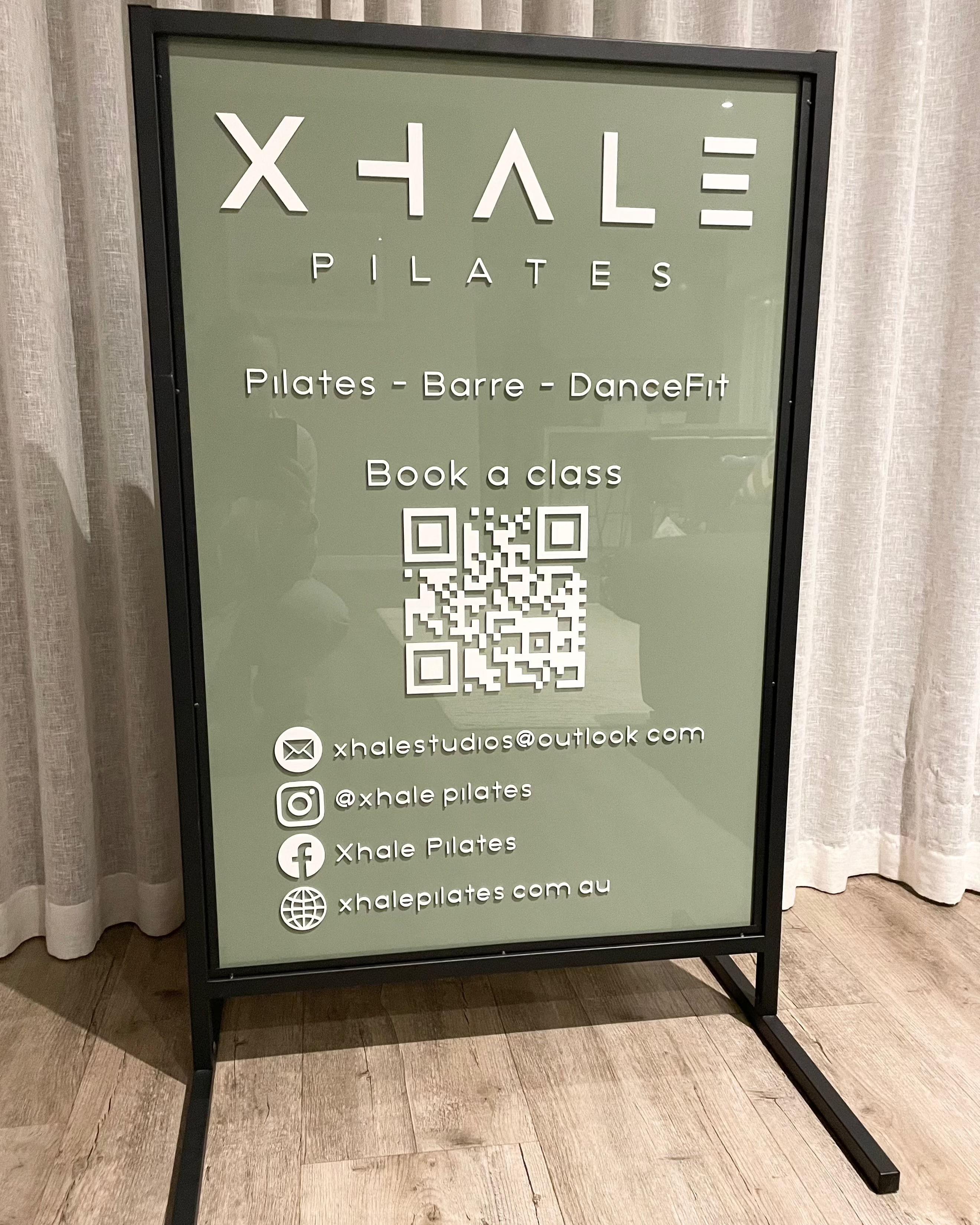 Green 3D acrylic T frame sign for wellness and beauty services
