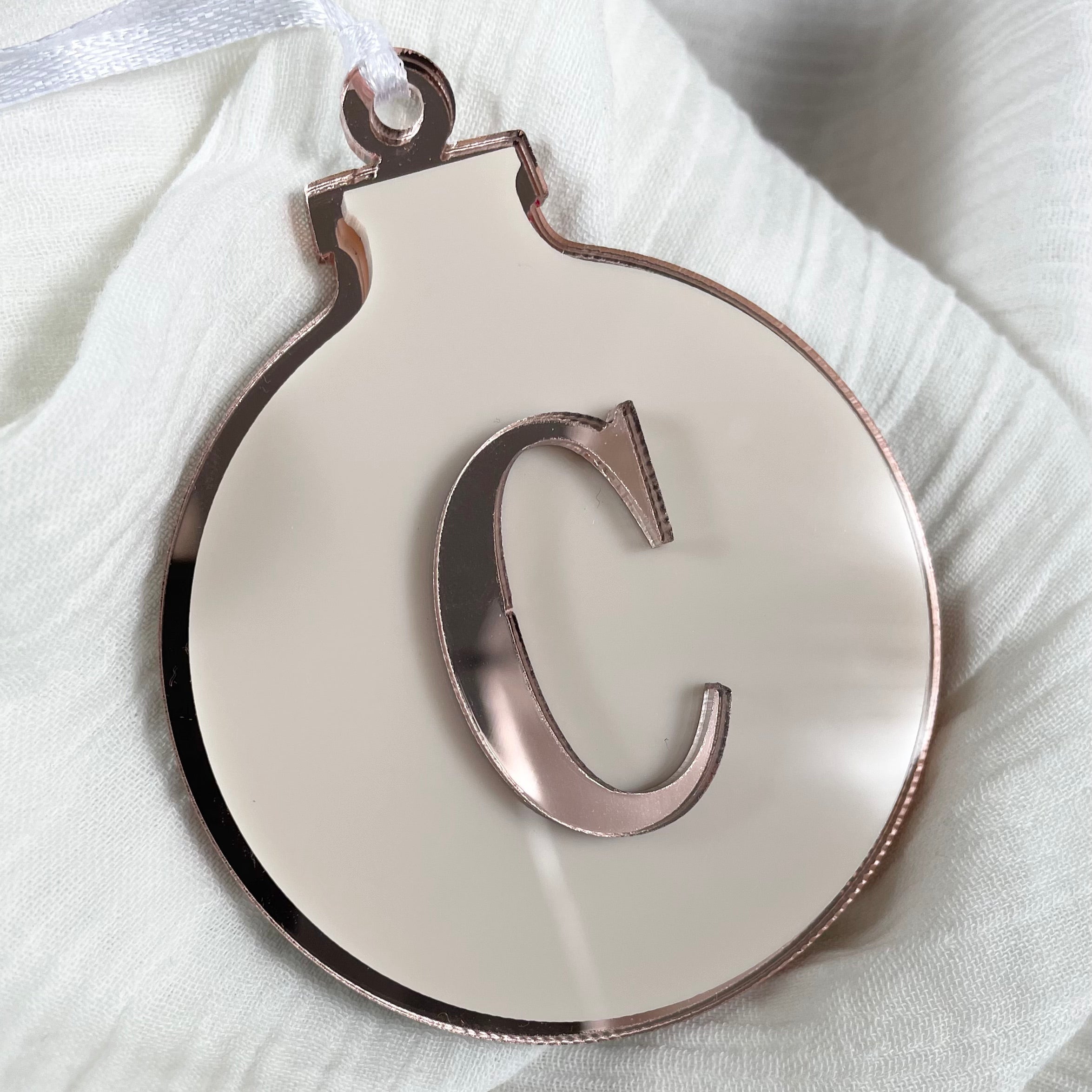 Elegant monogrammed Christmas bauble