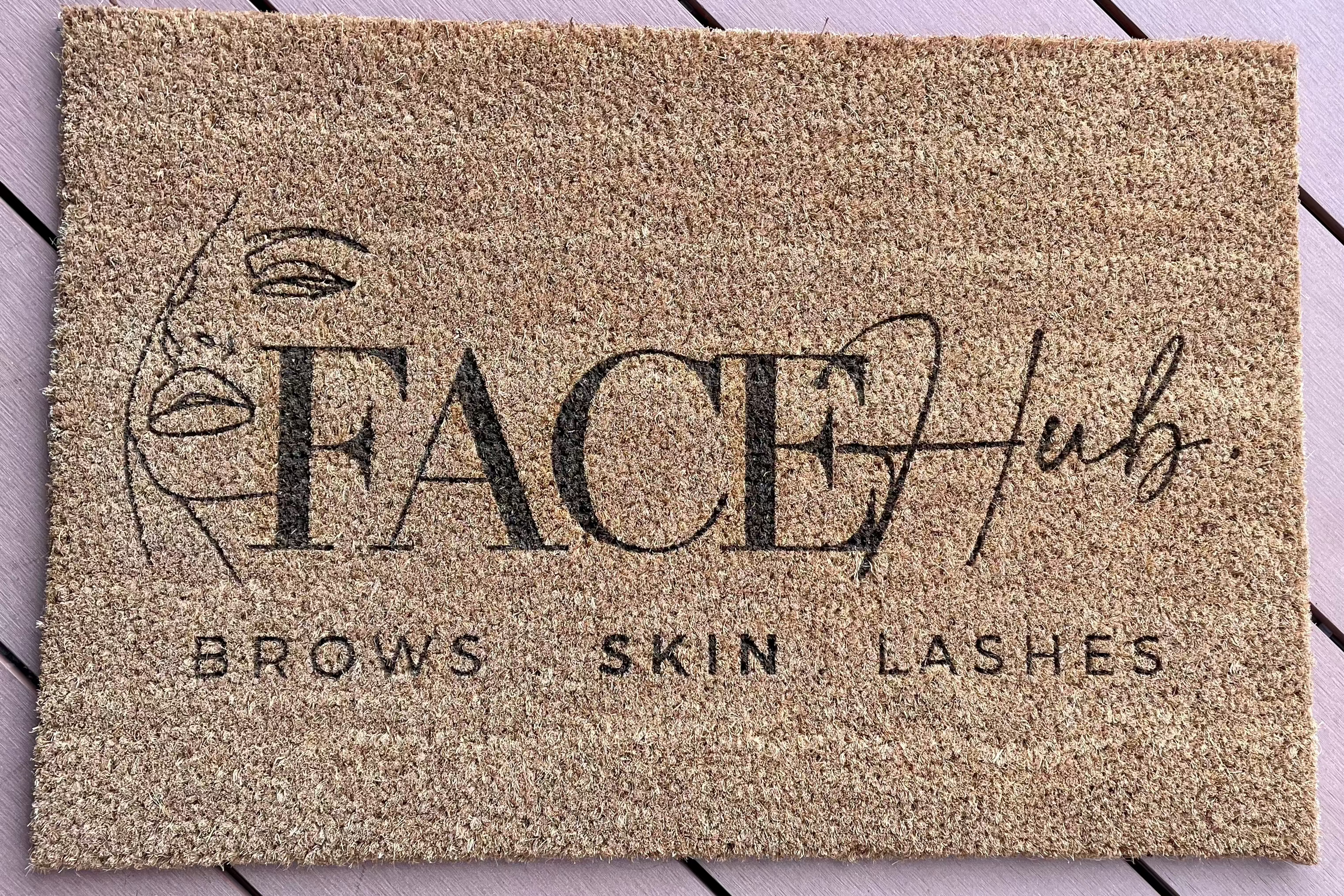 Beauty bar logo printed on a personalised door mat
