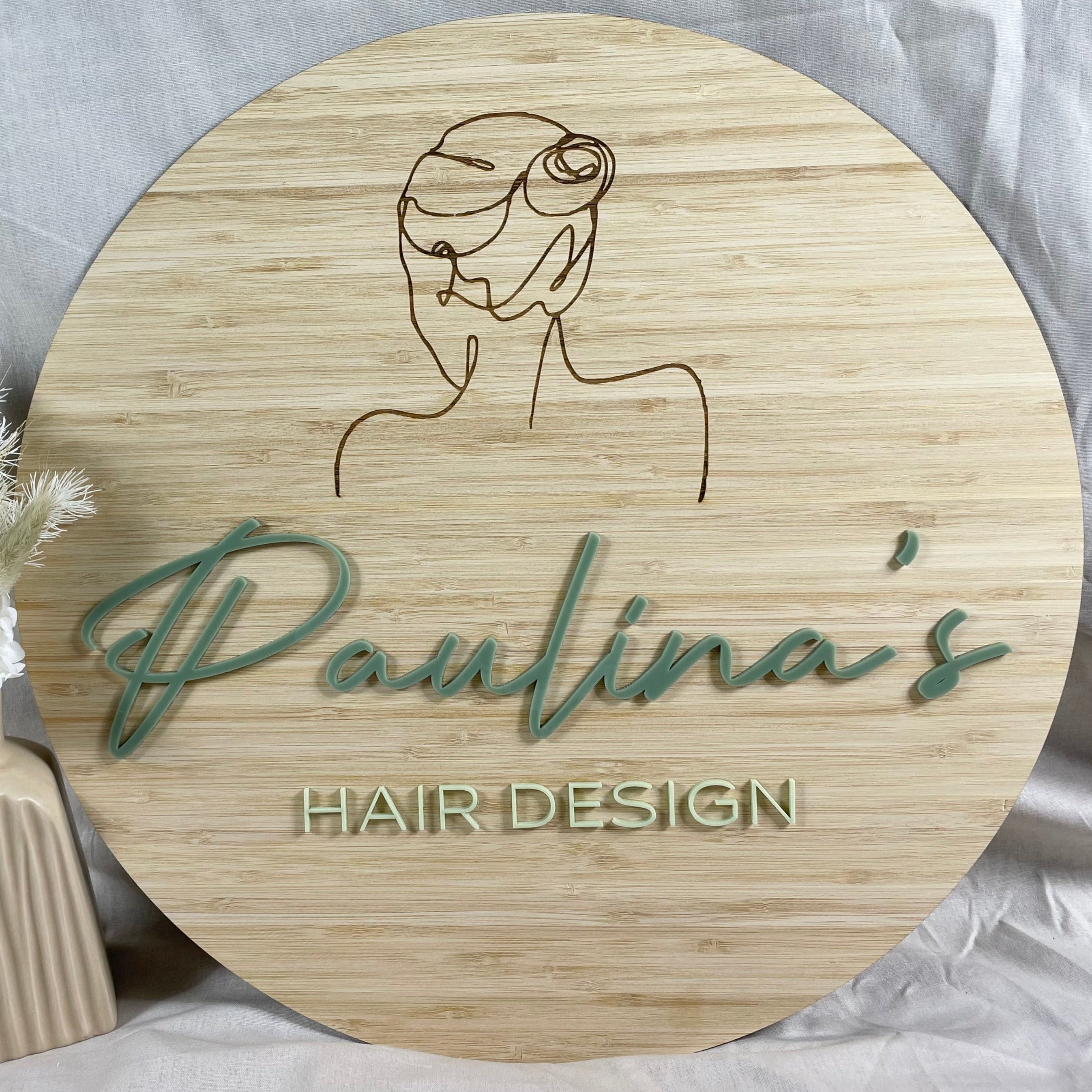 Paulina’s Hair Design bamboo sign with soft green acrylic script