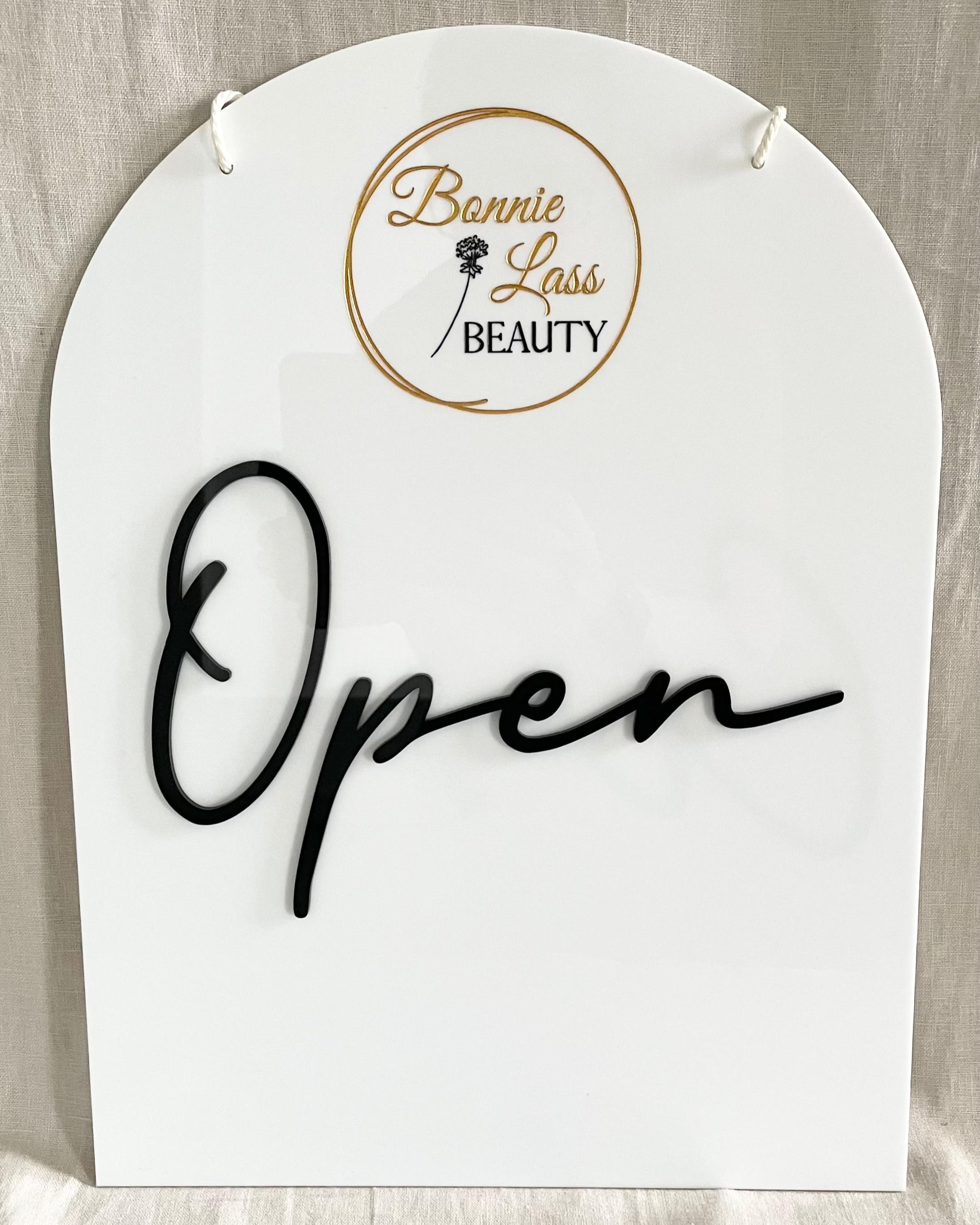 Open sign in white acrylic with black script – beauty salon door sign