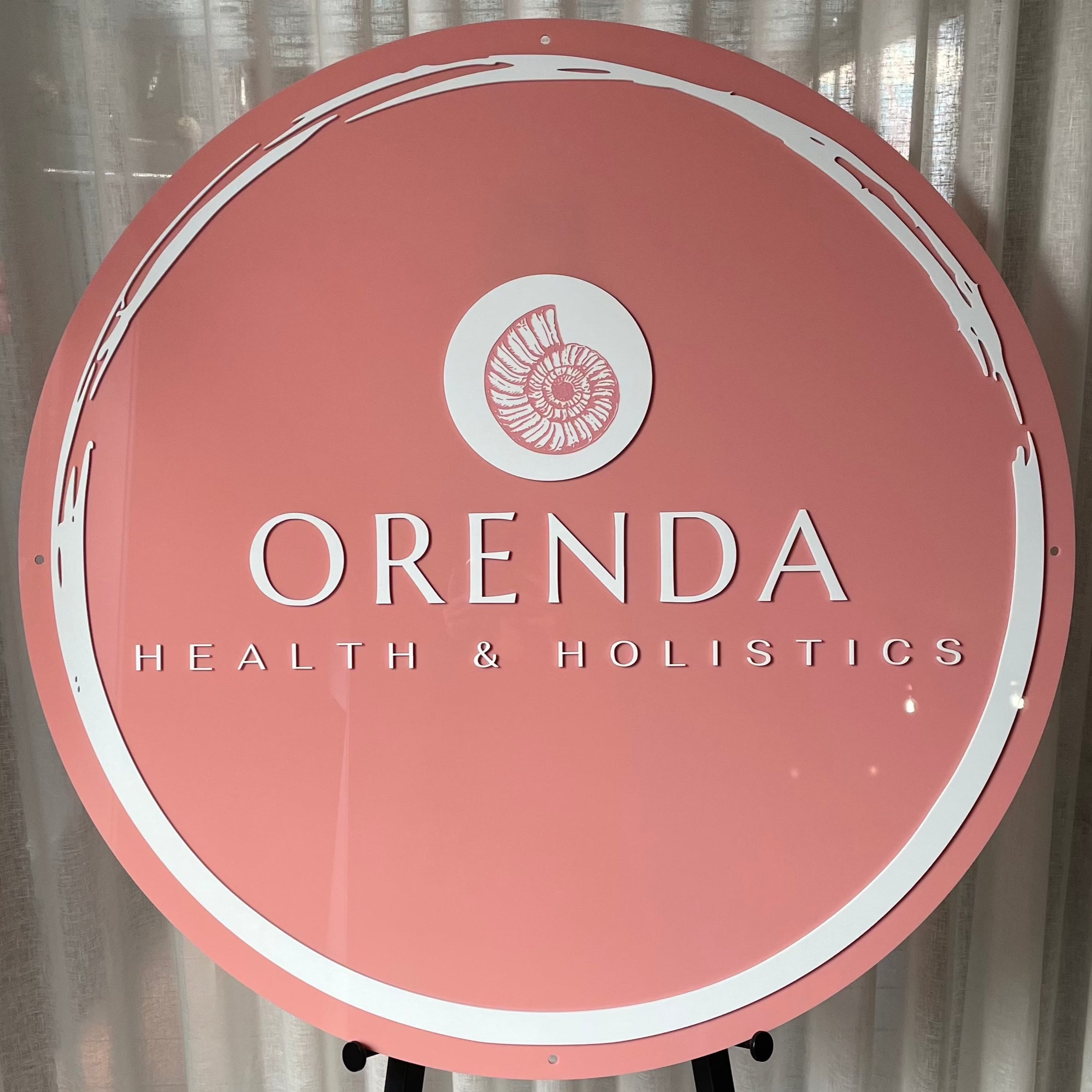 blush round acrylic cosmetic brand logo sign. orenda