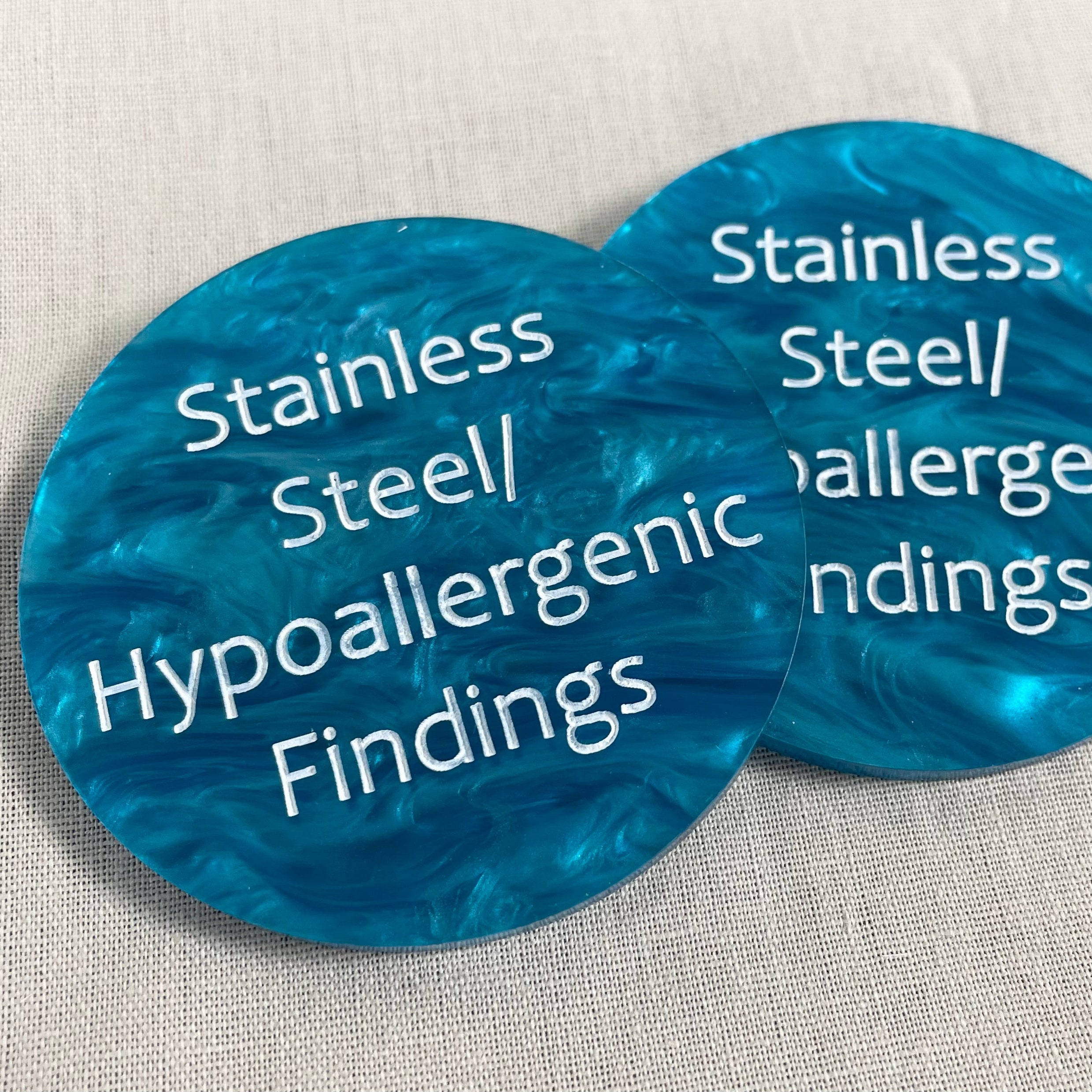 Blue acrylic price discs engraved with Stainless Steel and Hypoallergenic Findings