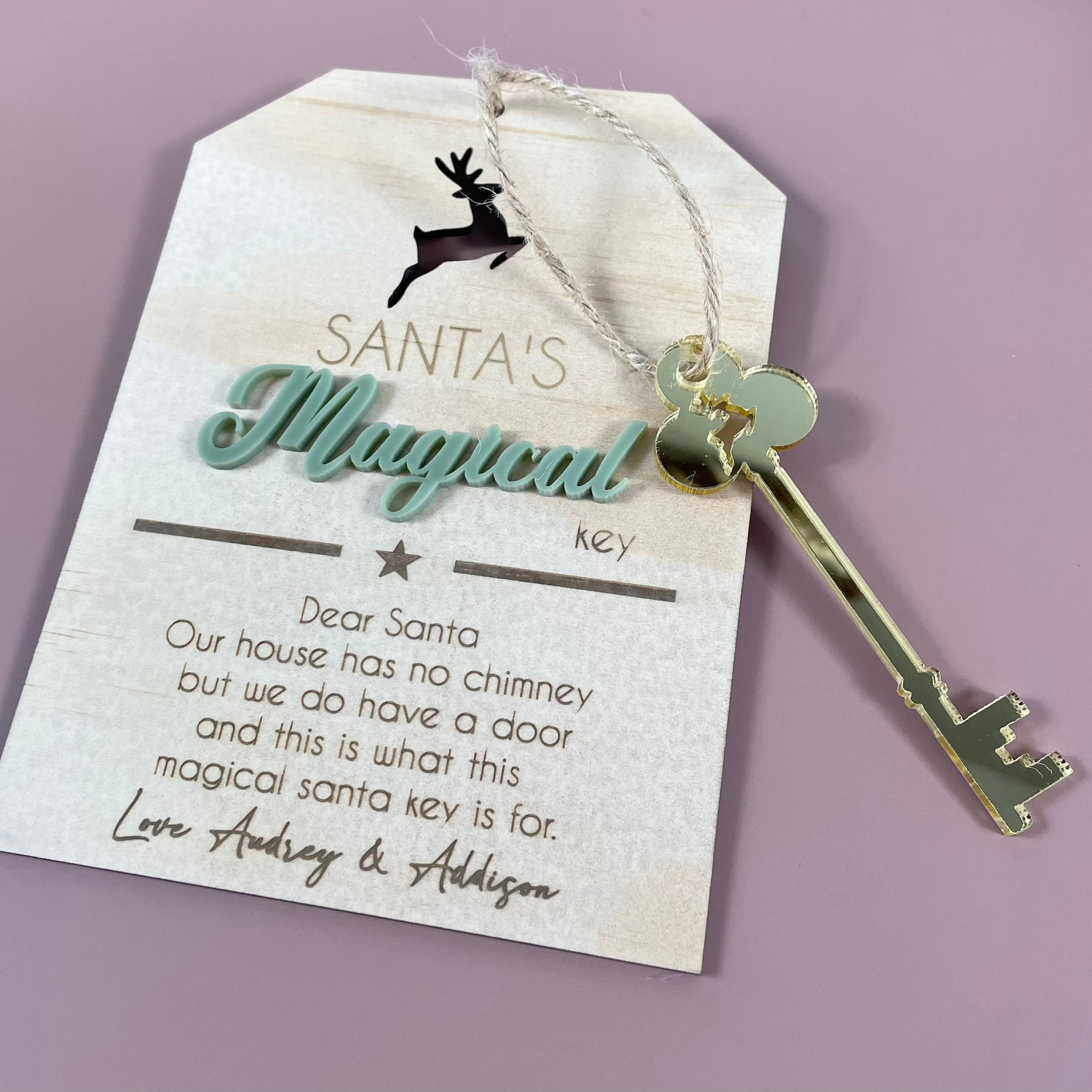 Custom Santa magical key with green lettering on engraved wooden tag, personalised Christmas gift