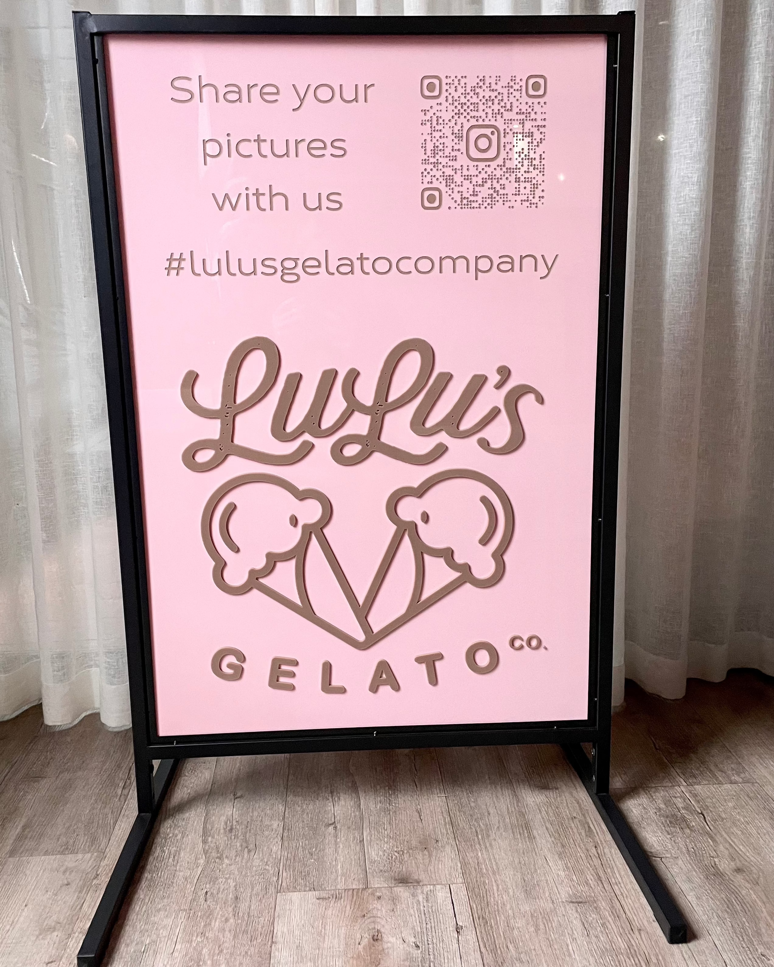 Pink acrylic T frame stand for gelato shop promotions