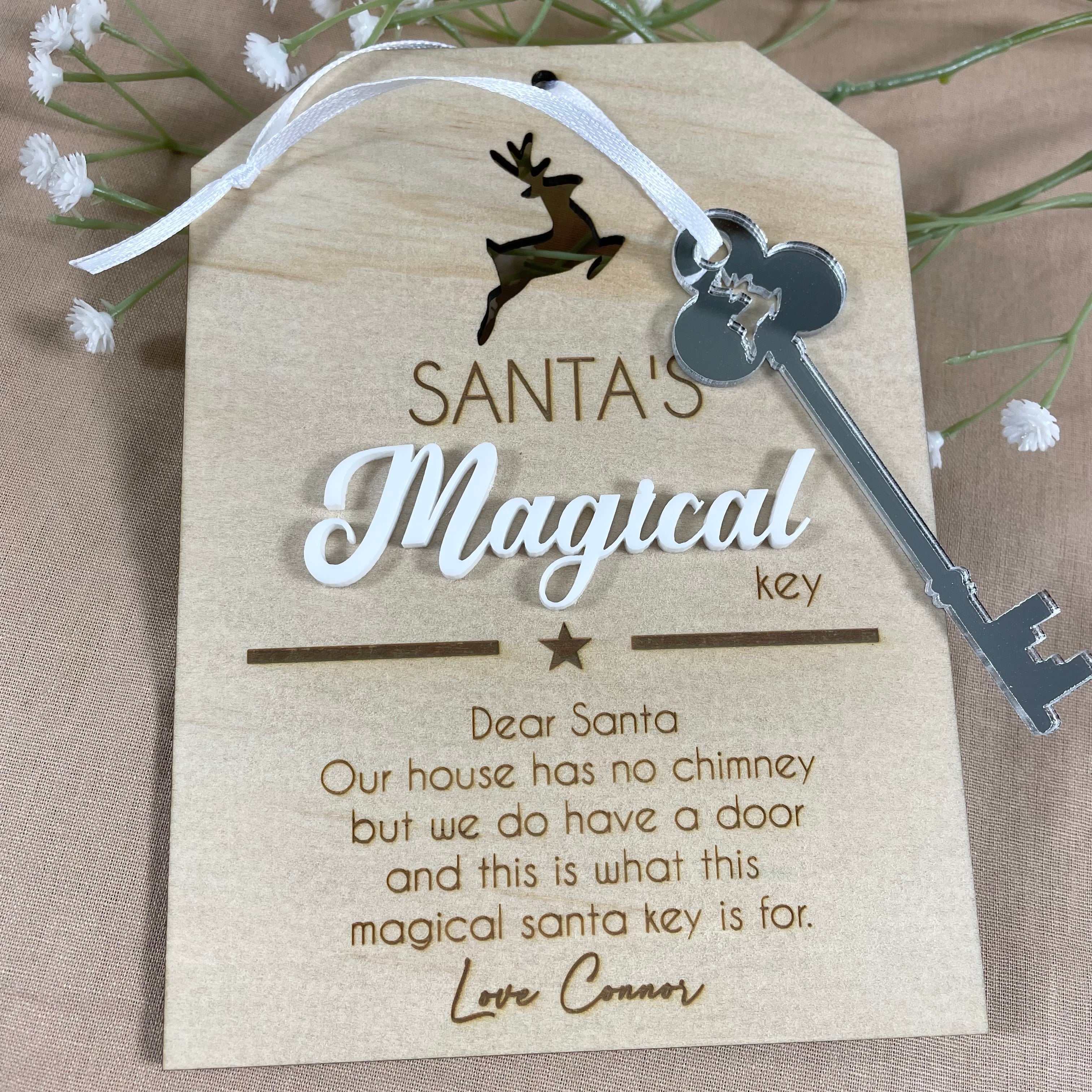 Engraved wooden Santa magical key tag with silver key and custom family name for Christmas Eve