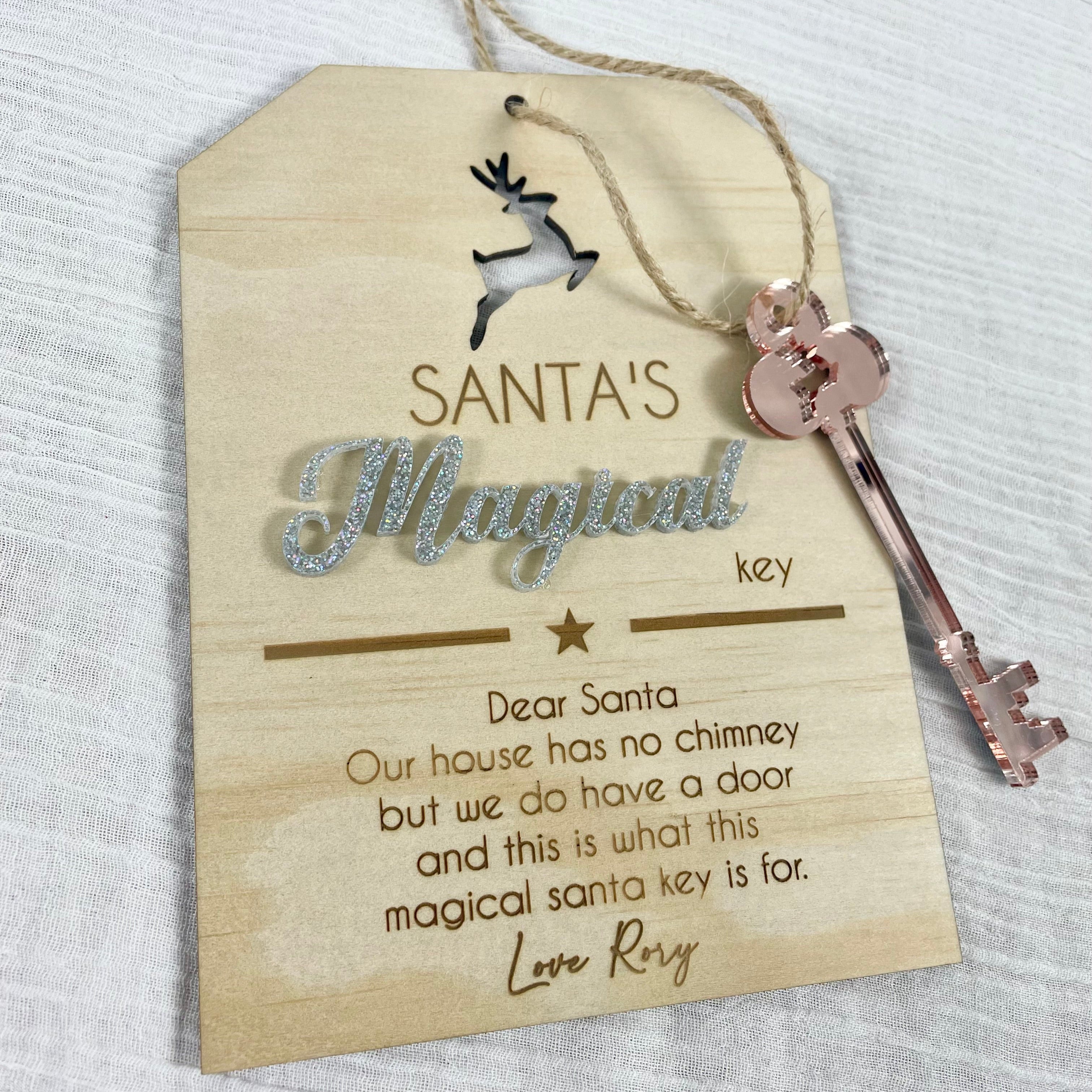 Santa’s magical key with engraved wooden tag and silver ribbon, personalised Christmas keepsake