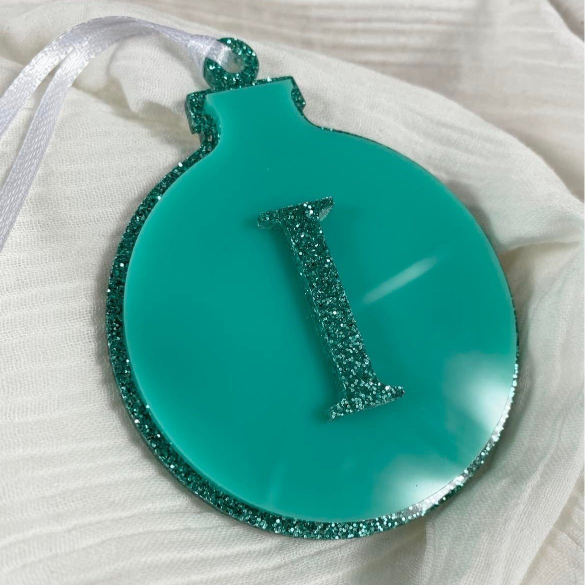 Elegant monogrammed Christmas bauble