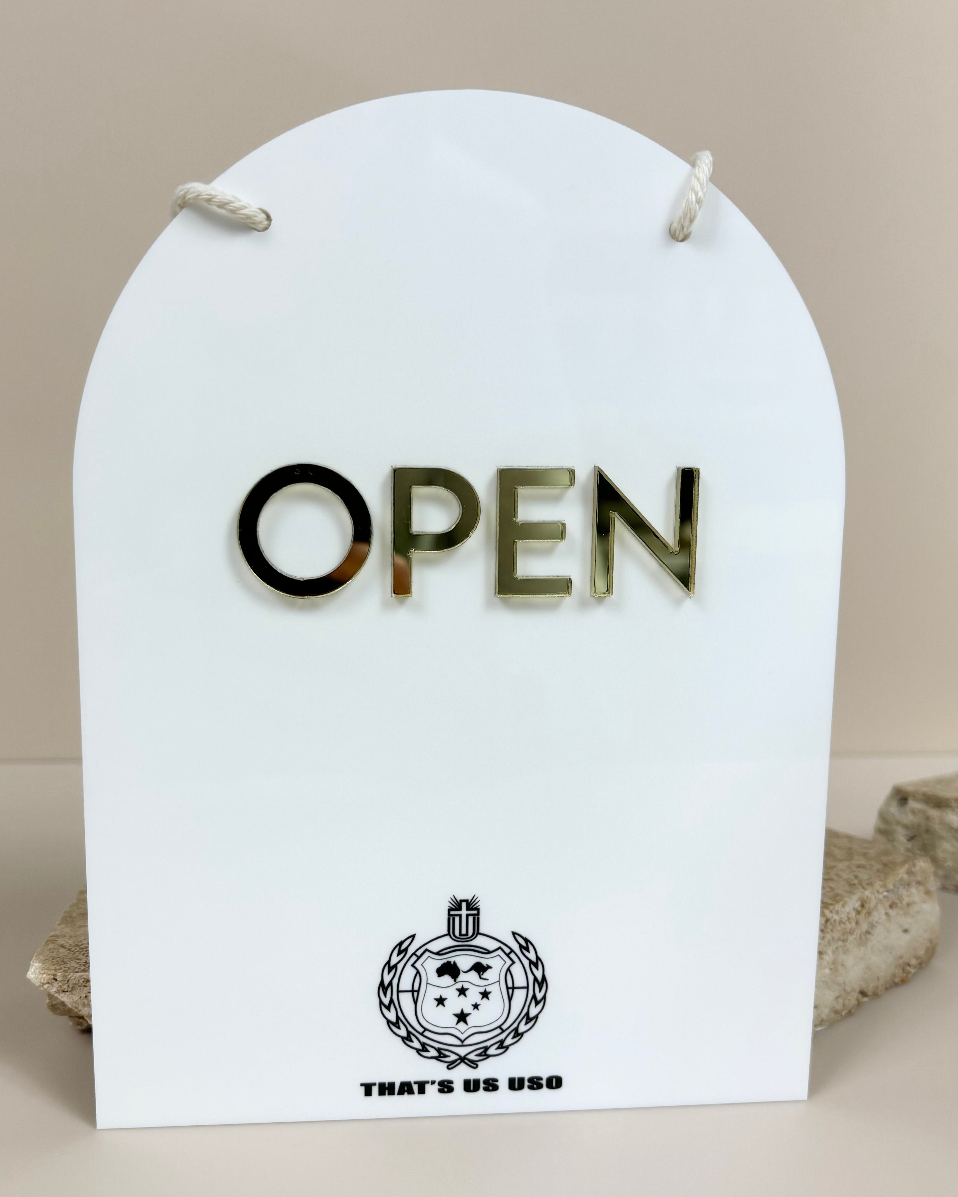 Arched white acrylic open sign with gold raised letters – boutique door sign
