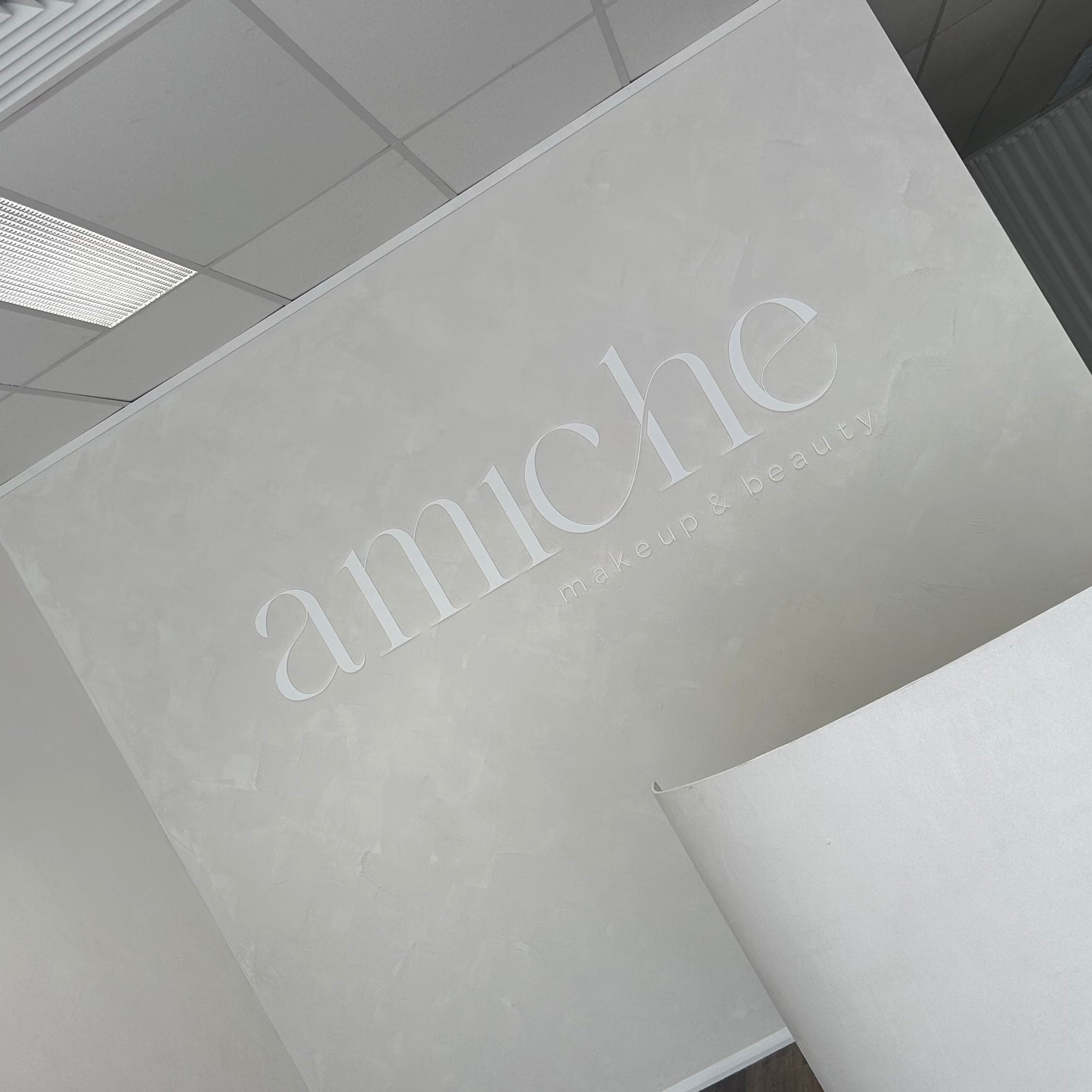 3d acrylic business wall sign amiche makeup and beauty raised lettering textured feature wall salon interior signage australia