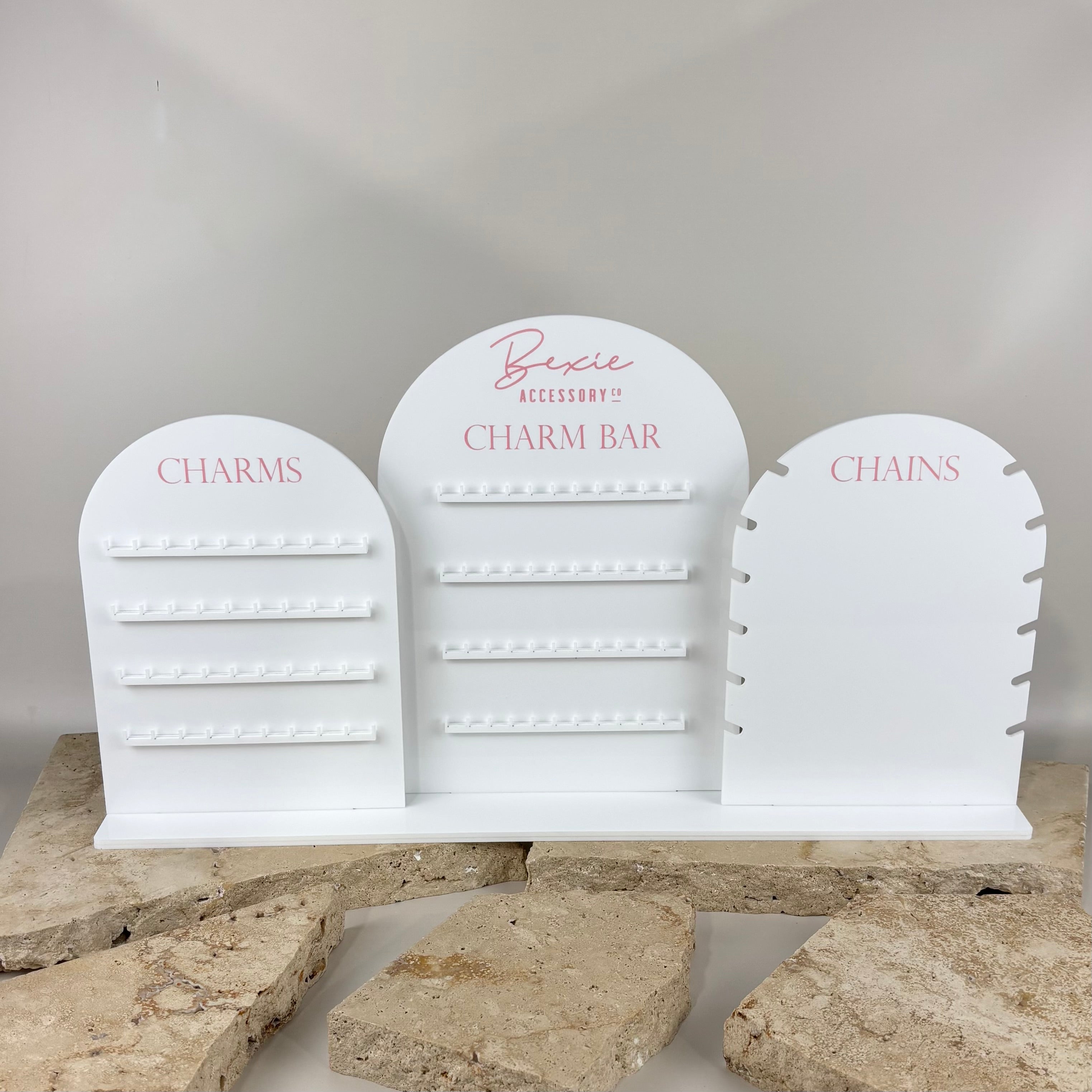 Custom acrylic charm bar display stand with branded logo, jewellery charm holders and chain organiser, ideal for retail stores and pop-up markets