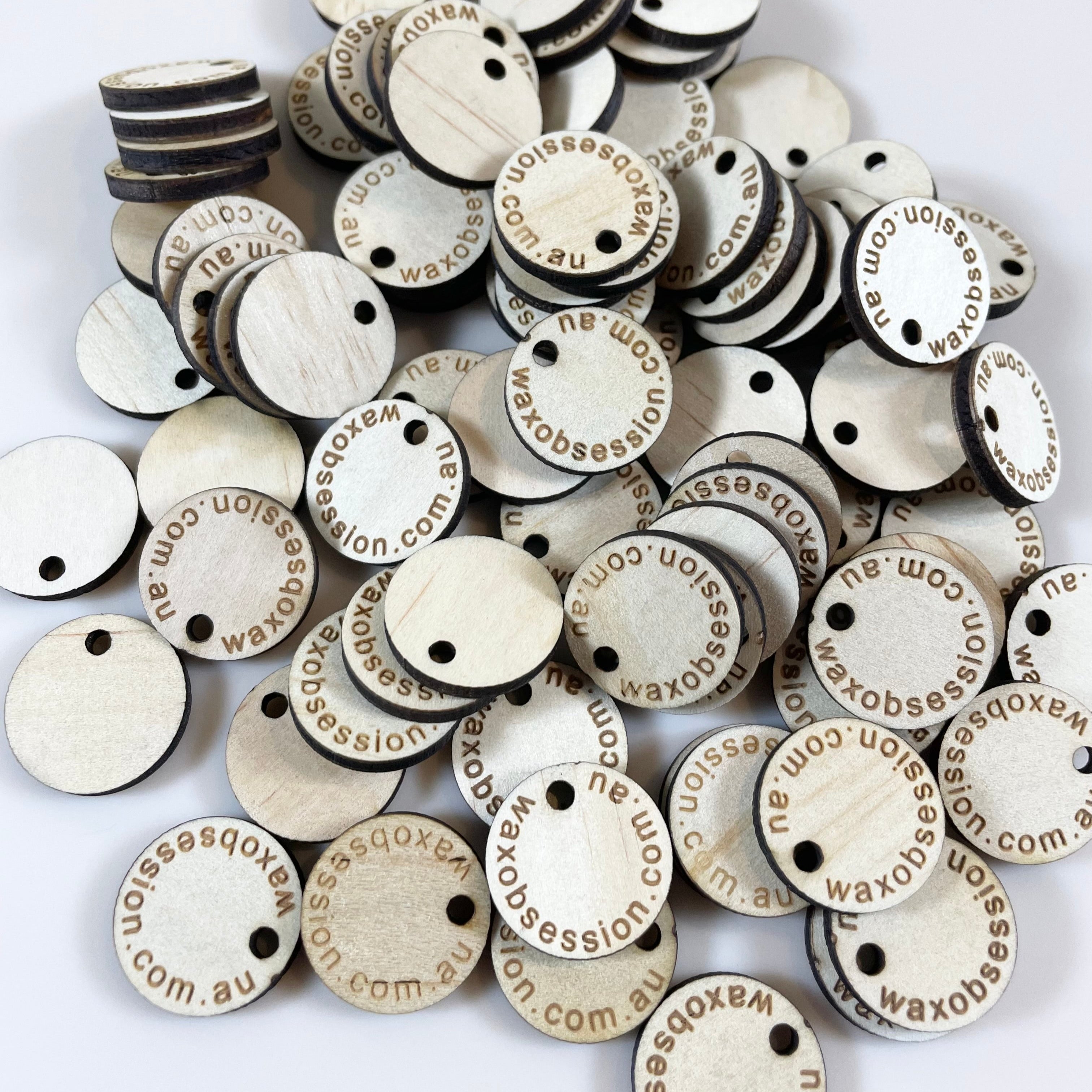 Bulk custom wooden product tags ready for packaging and branding
