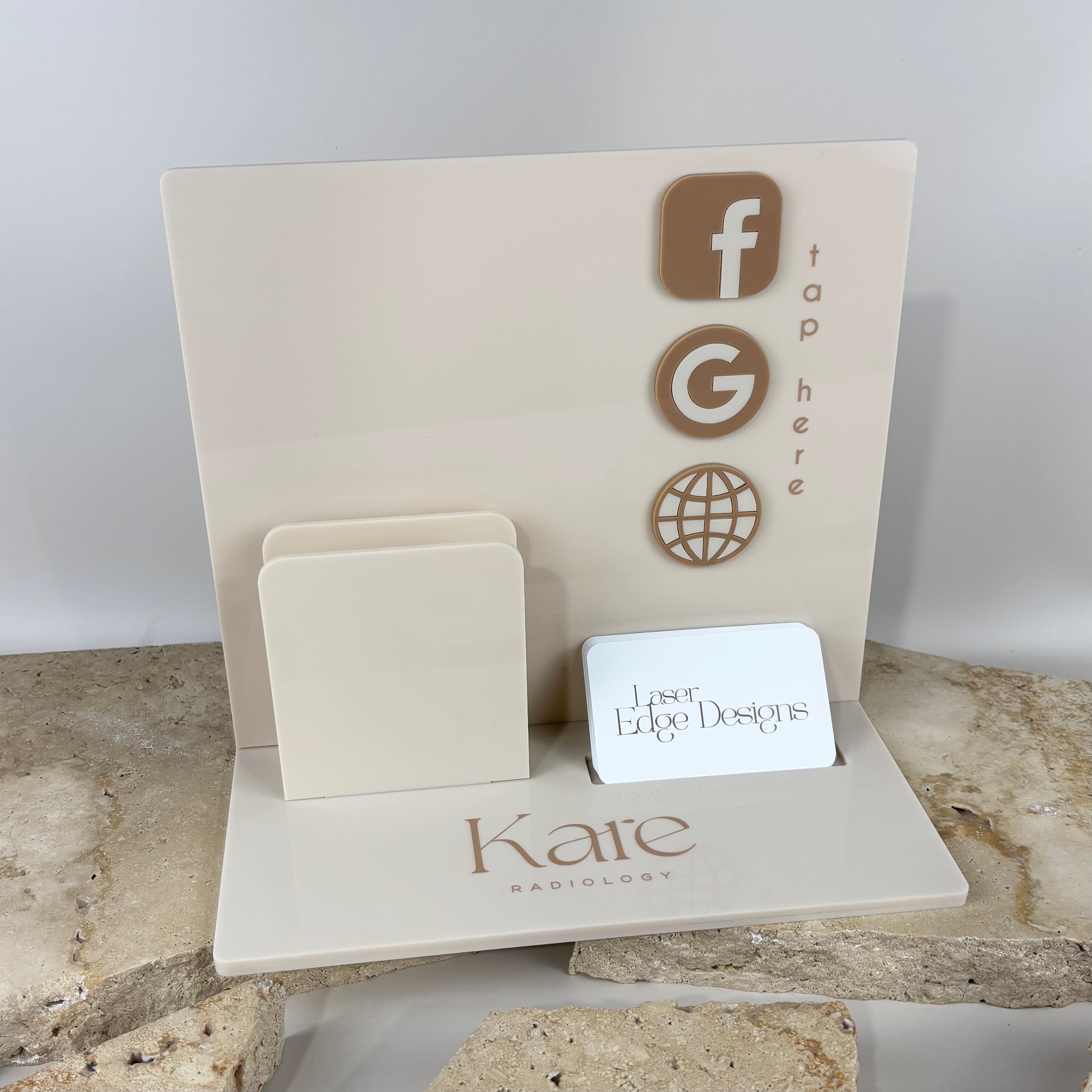Custom acrylic brochure holder with business branding, countertop display stand with card holder and social media icons for reception desks